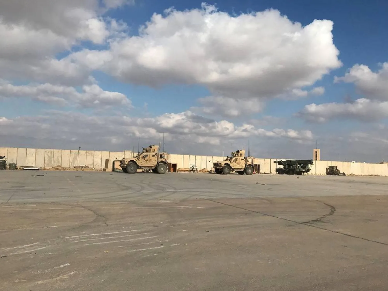 Military vehicles of US soldiers are seen at the al-Asad air base in Anbar province, Iraq, January 13, 2020. (Reuters)