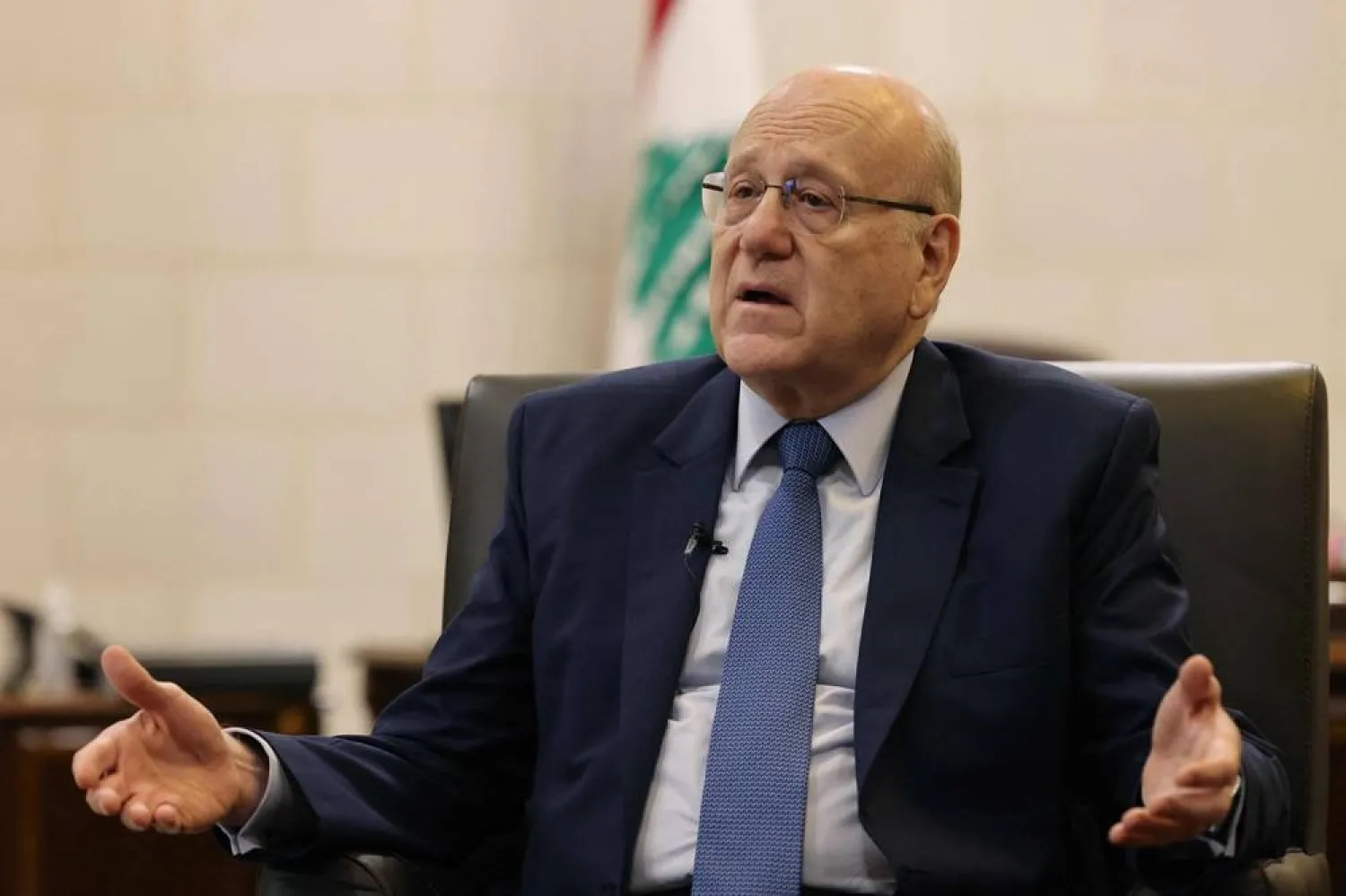 Lebanon's caretaker Prime Minister Najib Mikati reacts during an interview with AFP at his office in Beirut on October 30, 2023. (AFP)