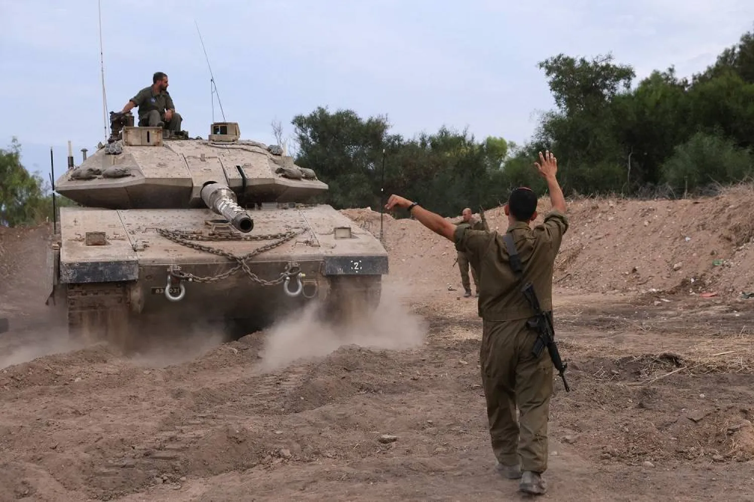 An Israeli tank is positioned in the western Galilee area, near Israel's northern border with Lebanon on October 30, 2023, (AFP)