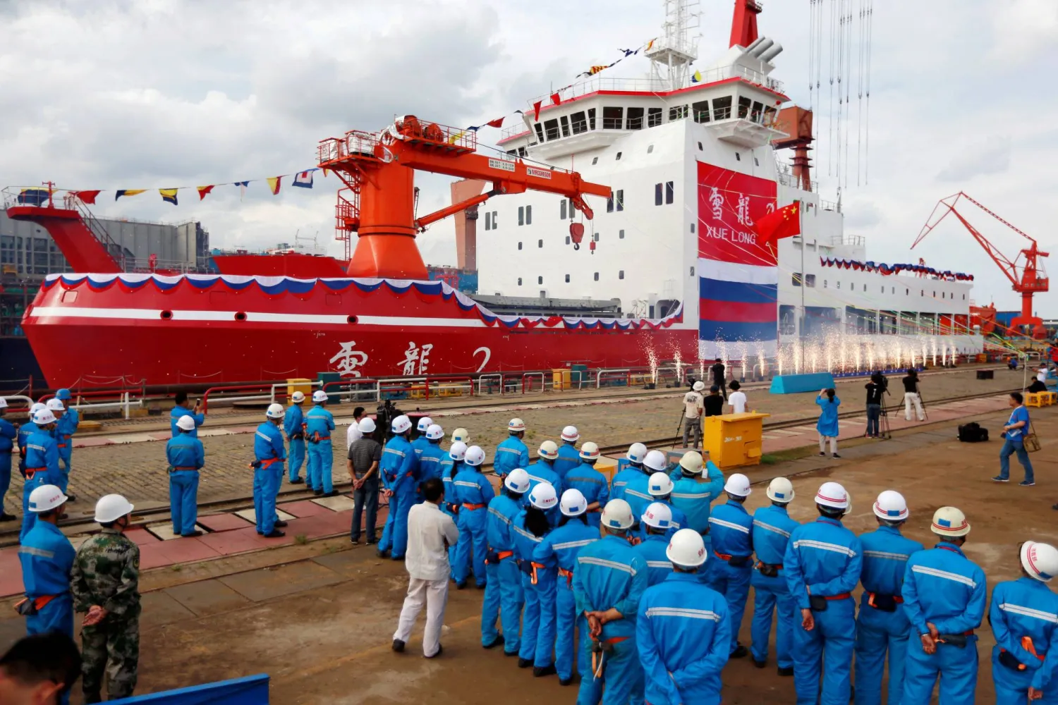FILE PHOTO: People attend the launch ceremony of China's first domestically built polar icebreaker Xuelong 2, or Snow Dragon 2, at a shipyard in Shanghai, China September 10, 2018. REUTERS/Stringer