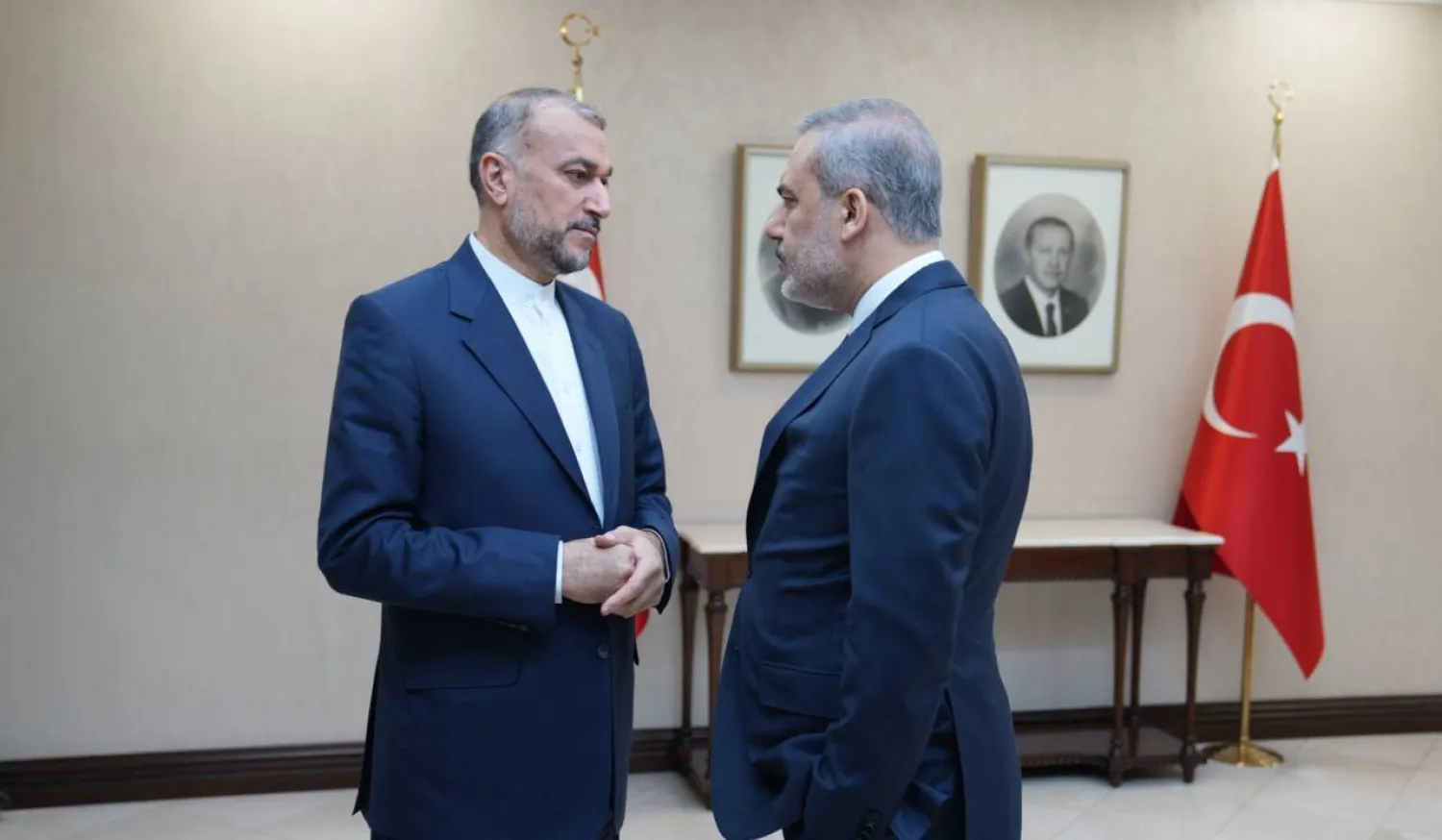 عبداللهيان يتحدث إلى فيدان خلال لقائهما في أنقرة اليوم (الخارجية الإيرانية)