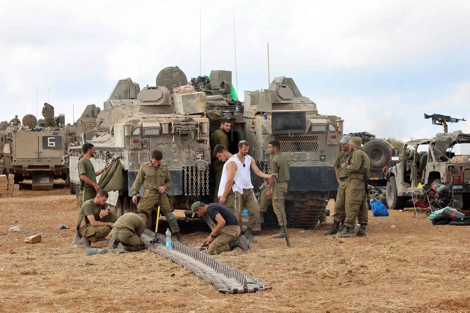 Israeli vehicles near Ashkelon last October 15 (AFP)