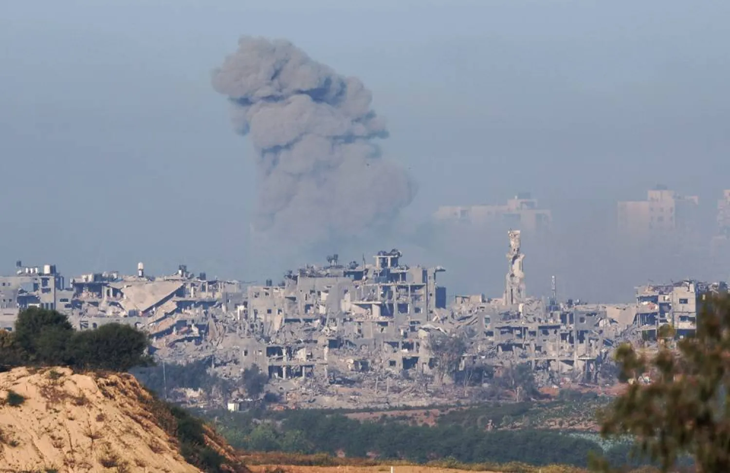 Smoke rises from the town of Beit Hanon, located in the northern part of the Gaza Strip, as a result of an Israeli airstrike, as seen from Sderot, Israel, 04 November 2023. (EPA)