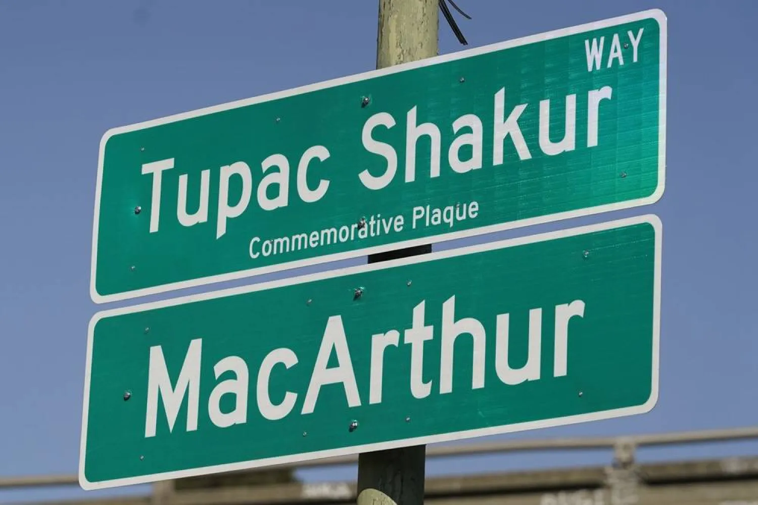 A new sign is seen following a street renaming ceremony for Tupac Shakur in Oakland, Calif., Friday, Nov. 3, 2023. (AP)