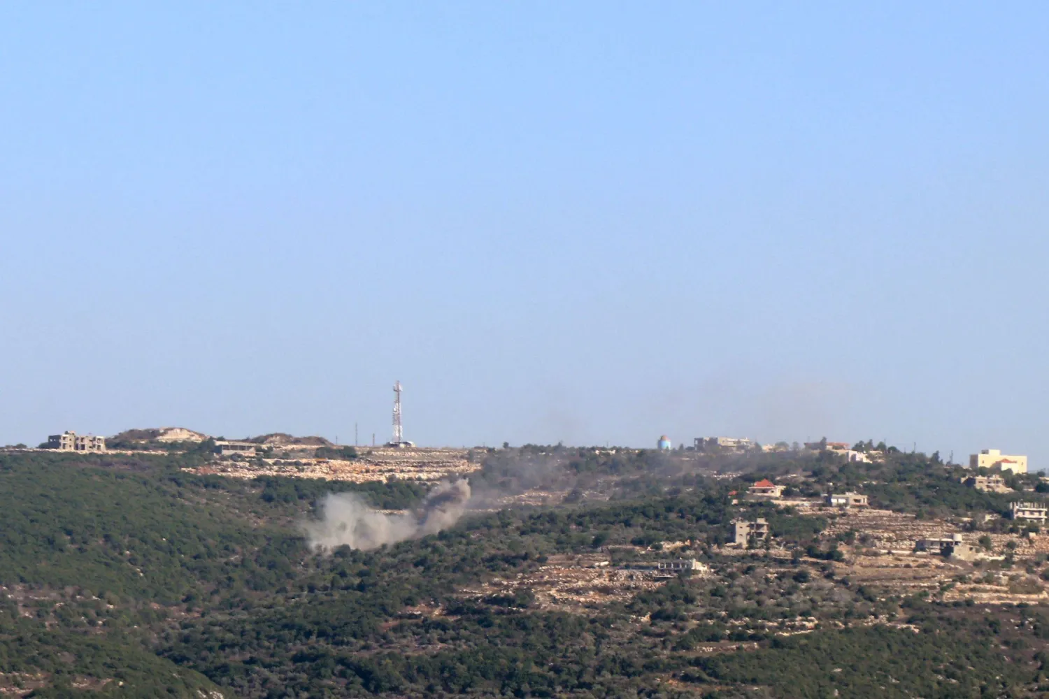 Smoke ascends after an Israeli shell landed on the outskirts of the Lebanese village of Marwahin, close to the southern Lebanese border with Israel on November 5, 2023. (Photo by AFP)