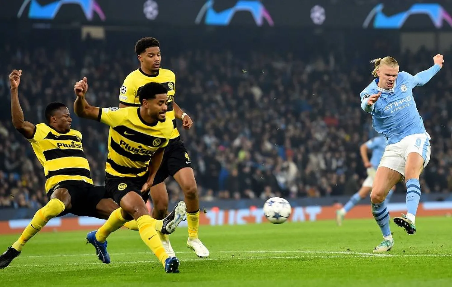 Erling Haaland (R) of Manchester City scores his second goal during the UEFA Champions League Group G match between Manchester City and Young Boys Bern, in Manchester, Britain, 07 November 2023. (EPA) 