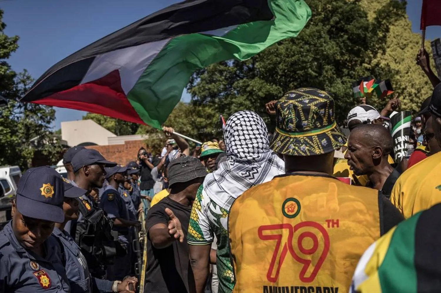  South African Police Service officers (SAPS) line up outside the Israeli Embassy during a demonstration in support of Gaza in Pretoria, on October 20, 2023. (AFP)