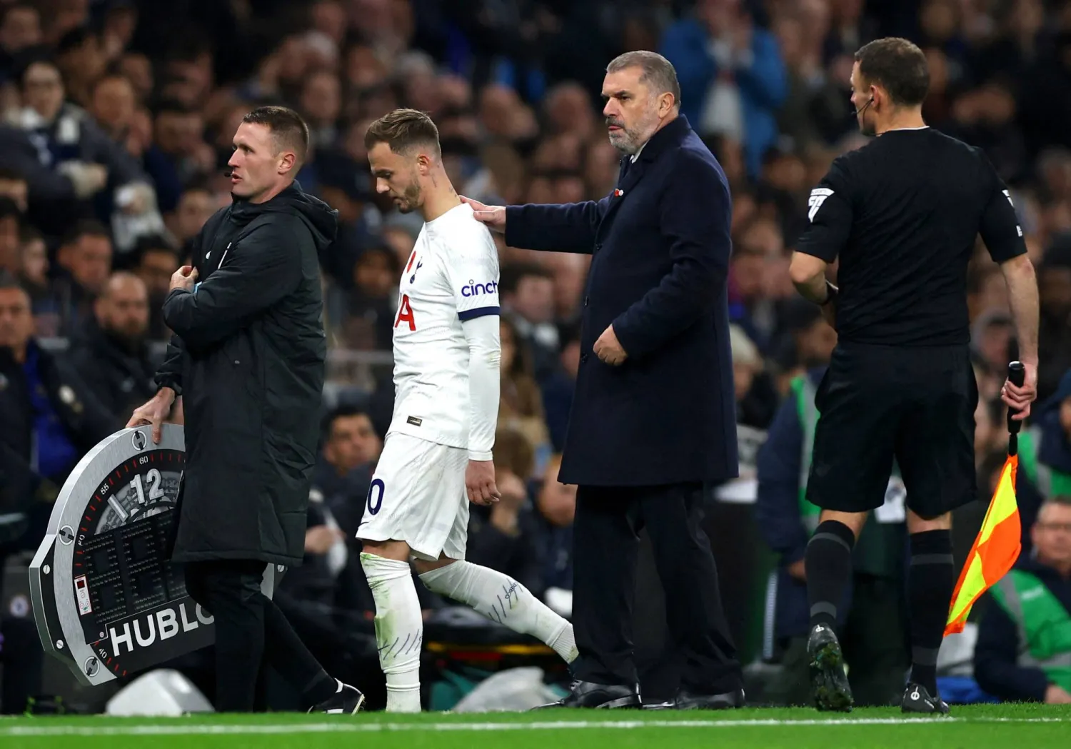 FILE PHOTO: Soccer Football - Premier League - Tottenham Hotspur v Chelsea - Tottenham Hotspur Stadium, London, Britain - November 6, 2023 Tottenham Hotspur's James Maddison with manager Ange Postecoglou as he substituted after sustaining an injury Action Images via Reuters/Matthew Childs 