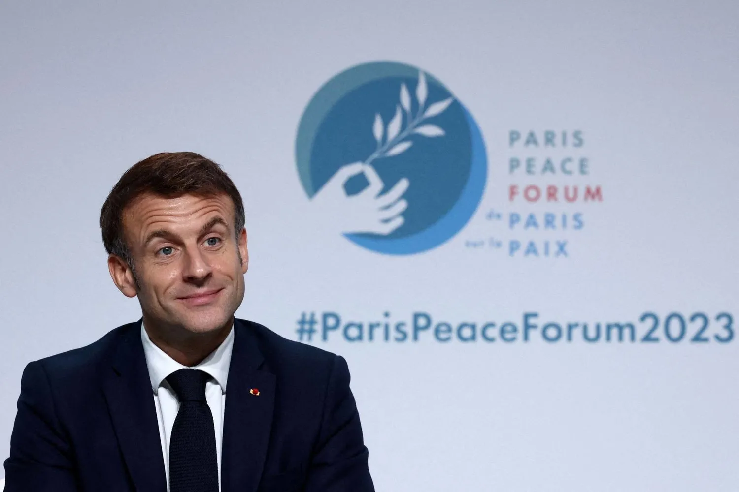 Fransa Cumhurbaşkanı Emmanuel Macron “Paris Barış Forumu”nun açılışını yapıyor (AFP)