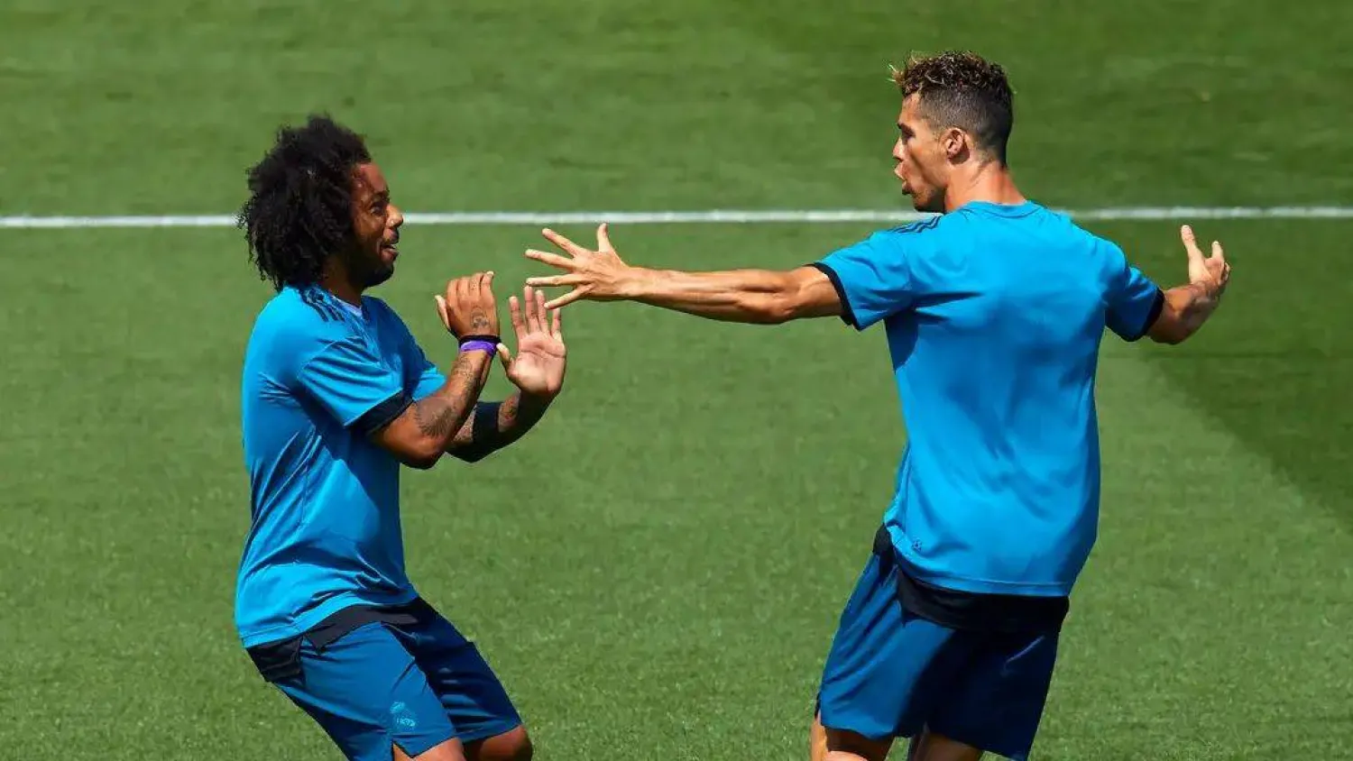 المخضرم مارسيلو وصديقه البرتغالي رونالدو (غيتي)