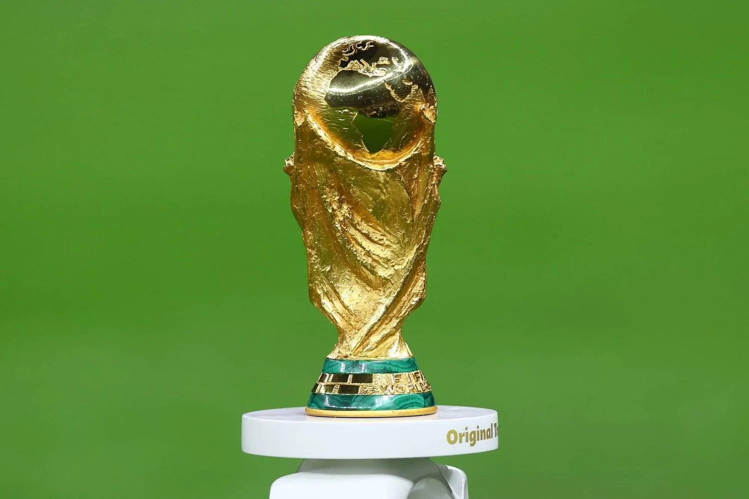 FILED - 18 December 2022, Qatar, Lusail: The World Cup trophy stands on the pitch prior to the start of the FIFA World Cup Qatar 2022 final soccer match between Argentina and France at Lusail Stadium. Photo: Tom Weller/dpa
