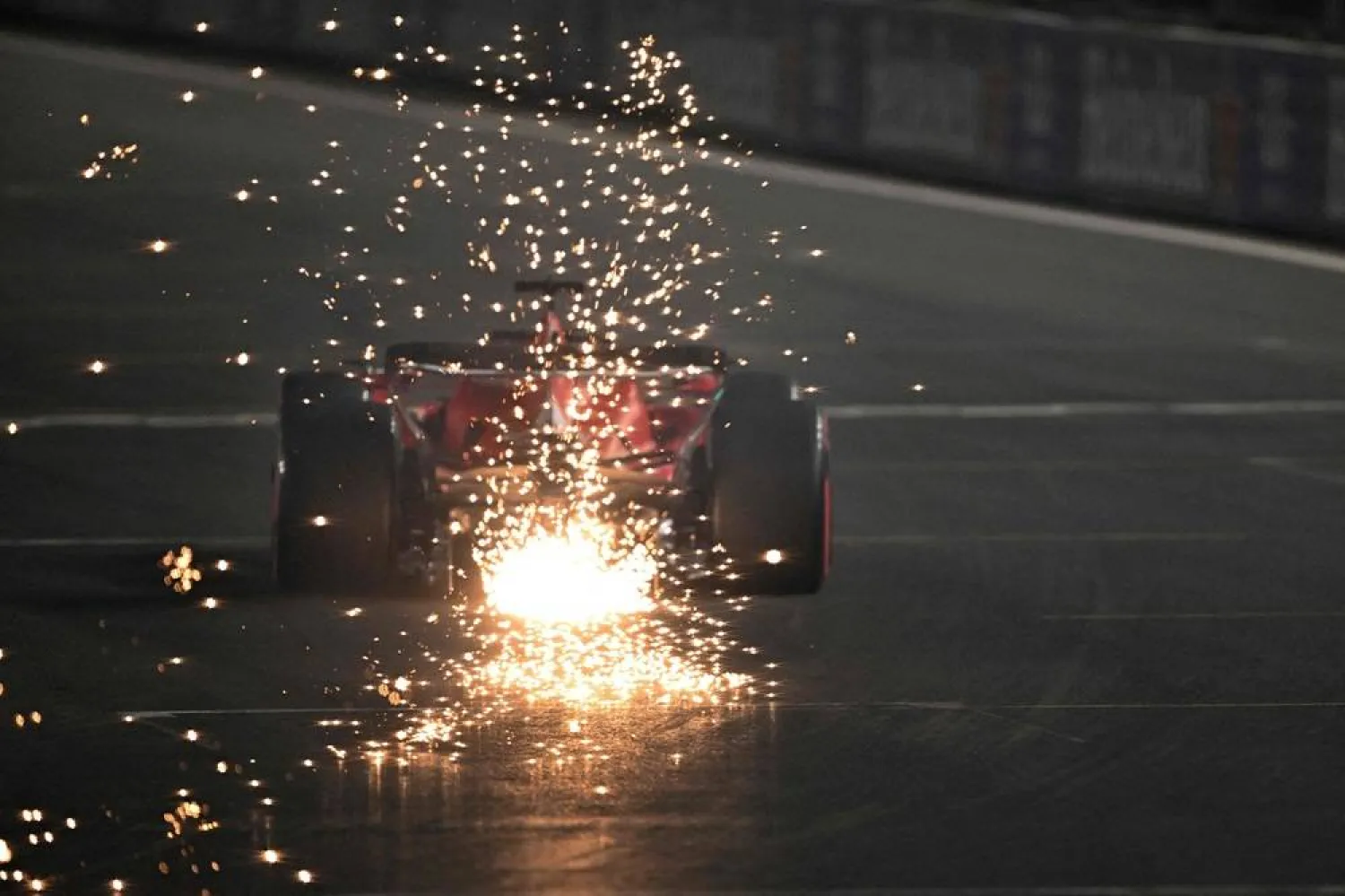  Ferrari's Monegasque driver Charles Leclerc races during the qualifying session for the Las Vegas Formula One Grand Prix on November 18, 2023, in Las Vegas, Nevada. (AFP)