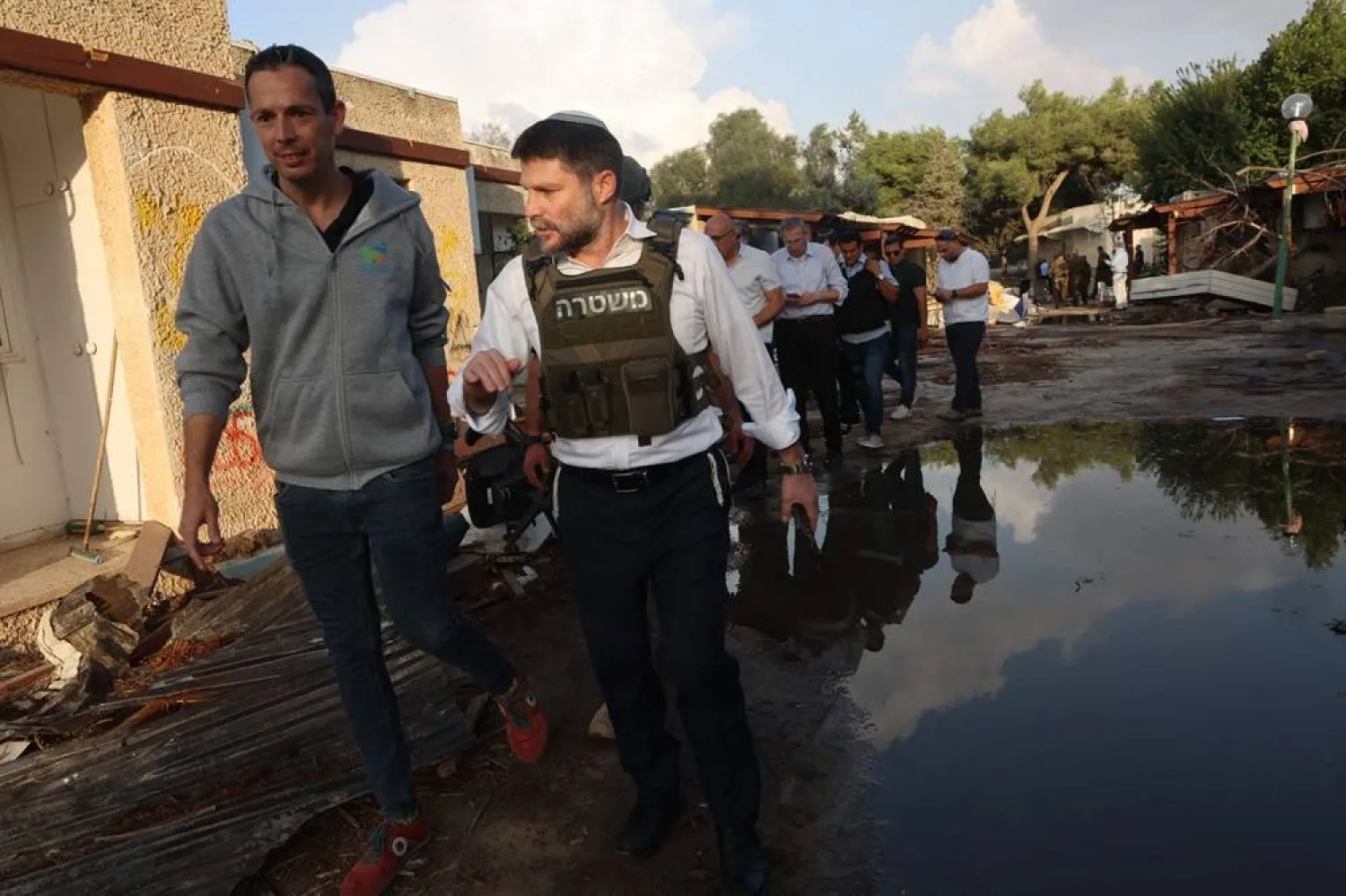 Israeli Finance Minister Bezalel Smotrich visits Kibbutz Kfar Aza near the border with the Gaza Strip on November 14, 2023, in the aftermath of an attack by Palestinian militants on October 7. (AFP) 