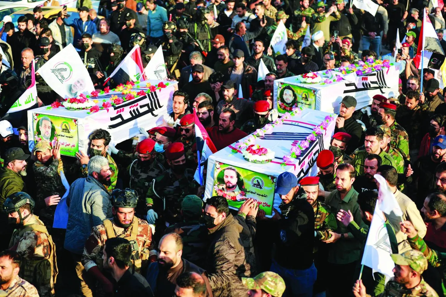 
جانب من تشييع قتلى «كتائب حزب الله « في بغداد (أ.ف.ب)