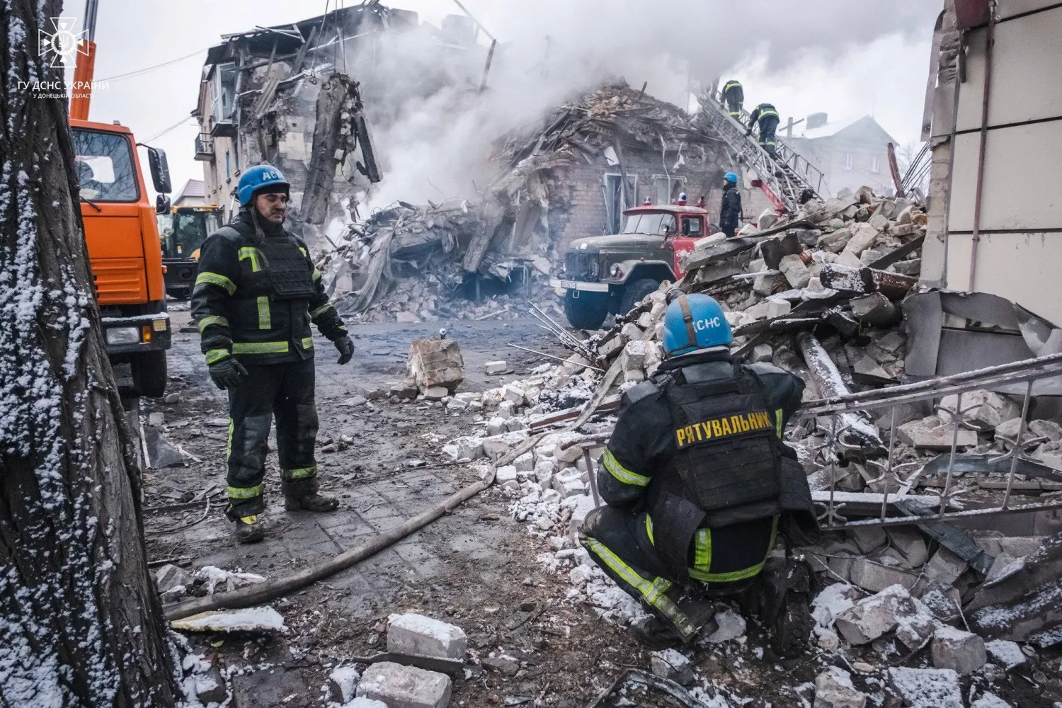 Rescues work at a site of a residential building heavily damaged by a Russian missile strike, amid Russia's attack on Ukraine, in the town of Novohrodivka, Donetsk region, Ukraine November 30, 2023. Press service of the State Emergency Service of Ukraine in Donetsk region/Handout via REUTERS 