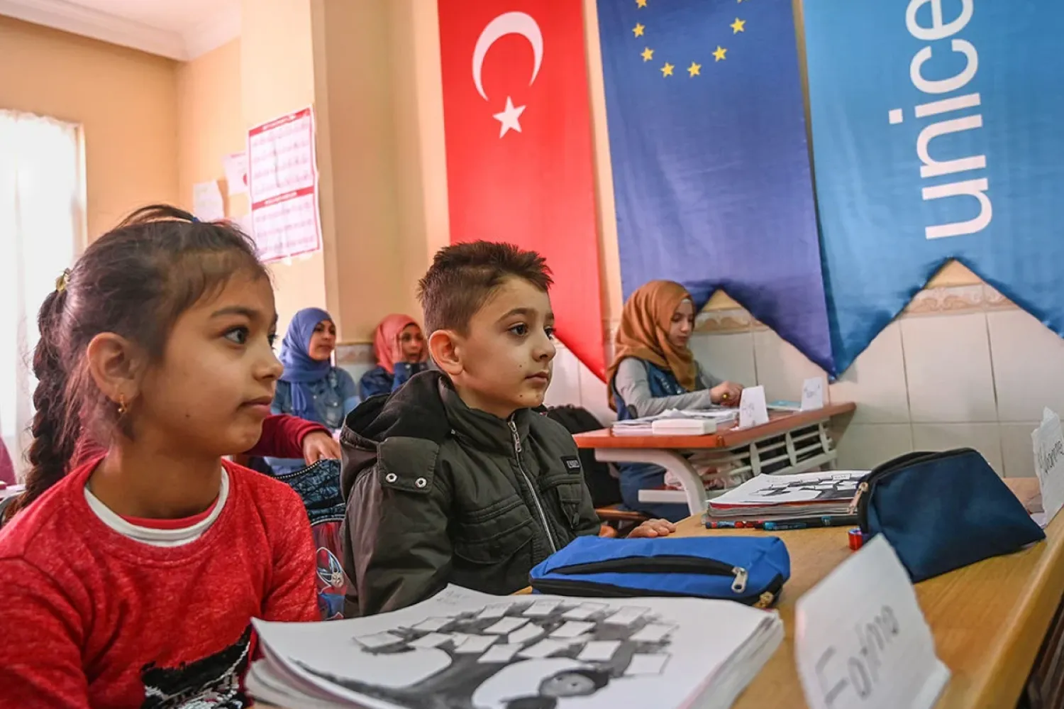 Suriyeli öğrencilerin sınıfta çok fazla sayıda olmasına Türk aileler itiraz ediyor (AFP)