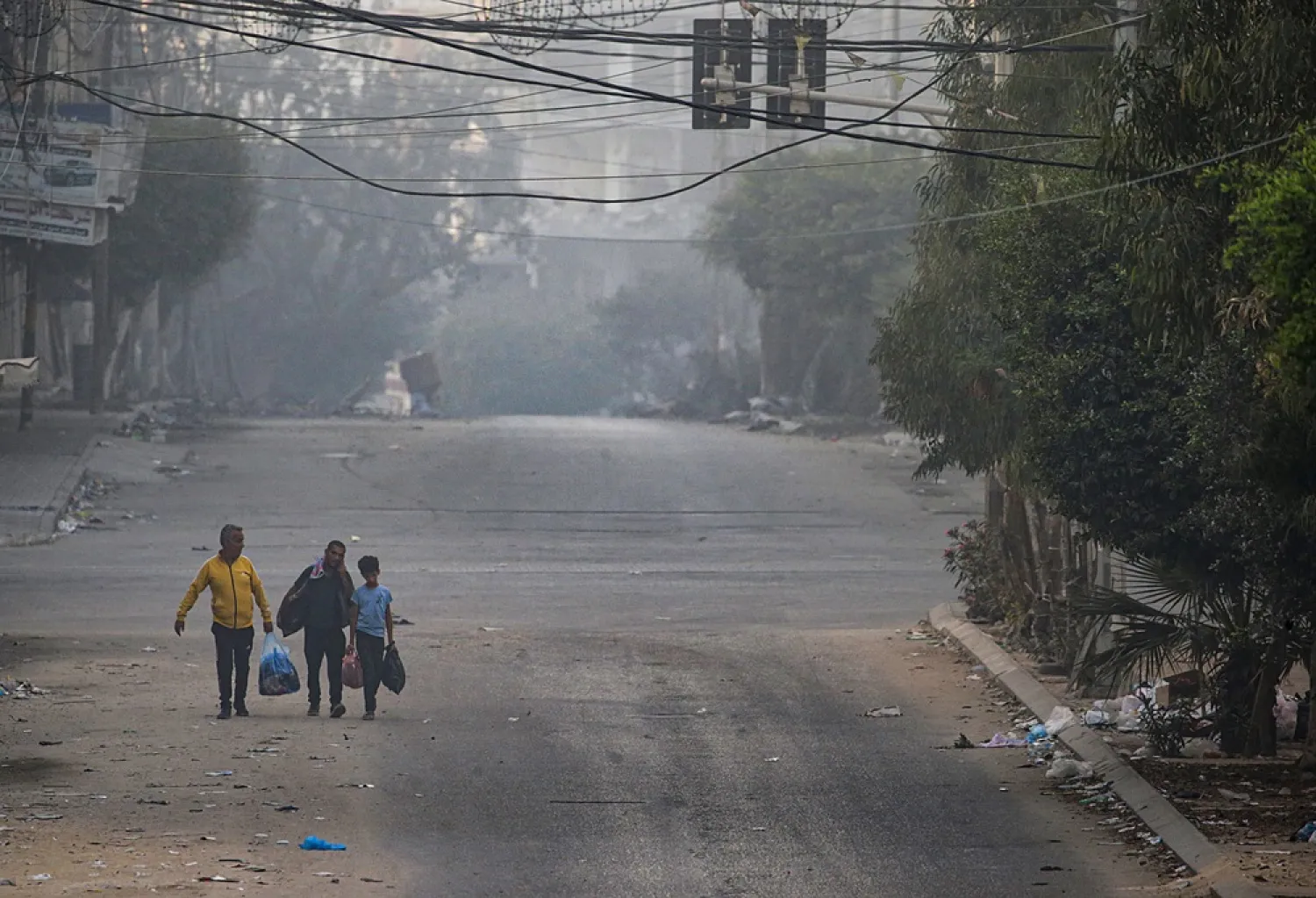 Residents evacuate Gaza City on foot during increased military operations in the northern Gaza Strip on 07 November 2023. (EPA)