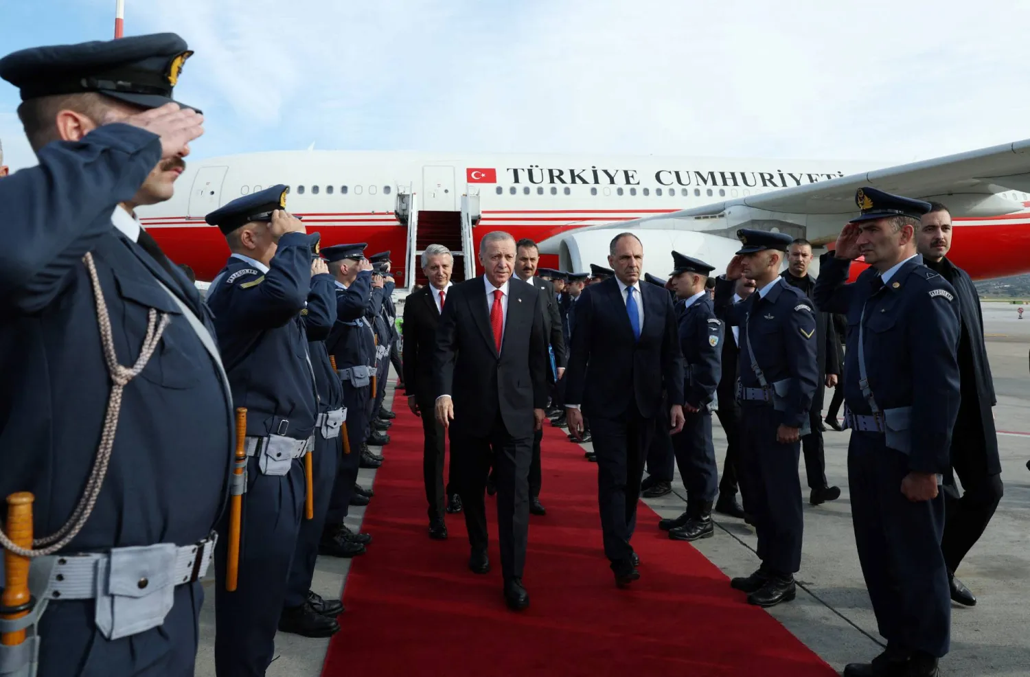 Turkish President Tayyip Erdogan is welcomed by Greek Foreign Minister George Gerapetritis upon his arrival at the Eleftherios Venizelos International Airport in Athens, Greece December 7, 2023. Turkish Presidential Press Office/Handout via REUTERS