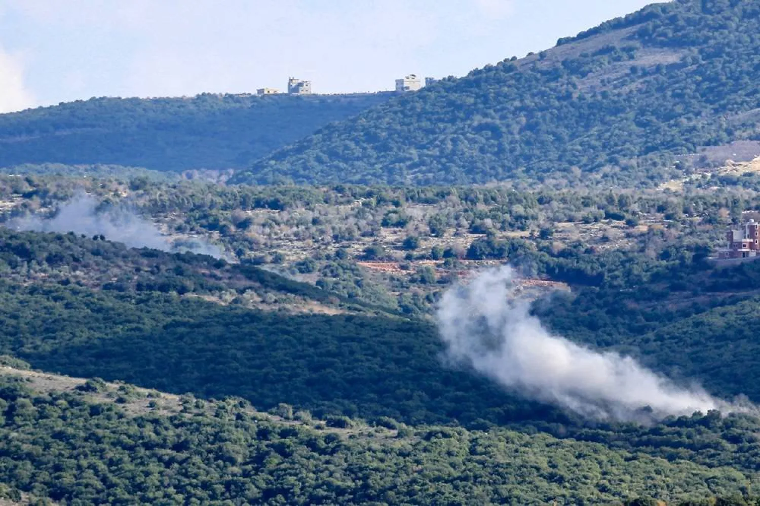 Smoke rises after an Israeli strike over a forested area near Alma Al-Shaab in southern Lebanon near the border with Israel on December 6, 2023. (AFP)
