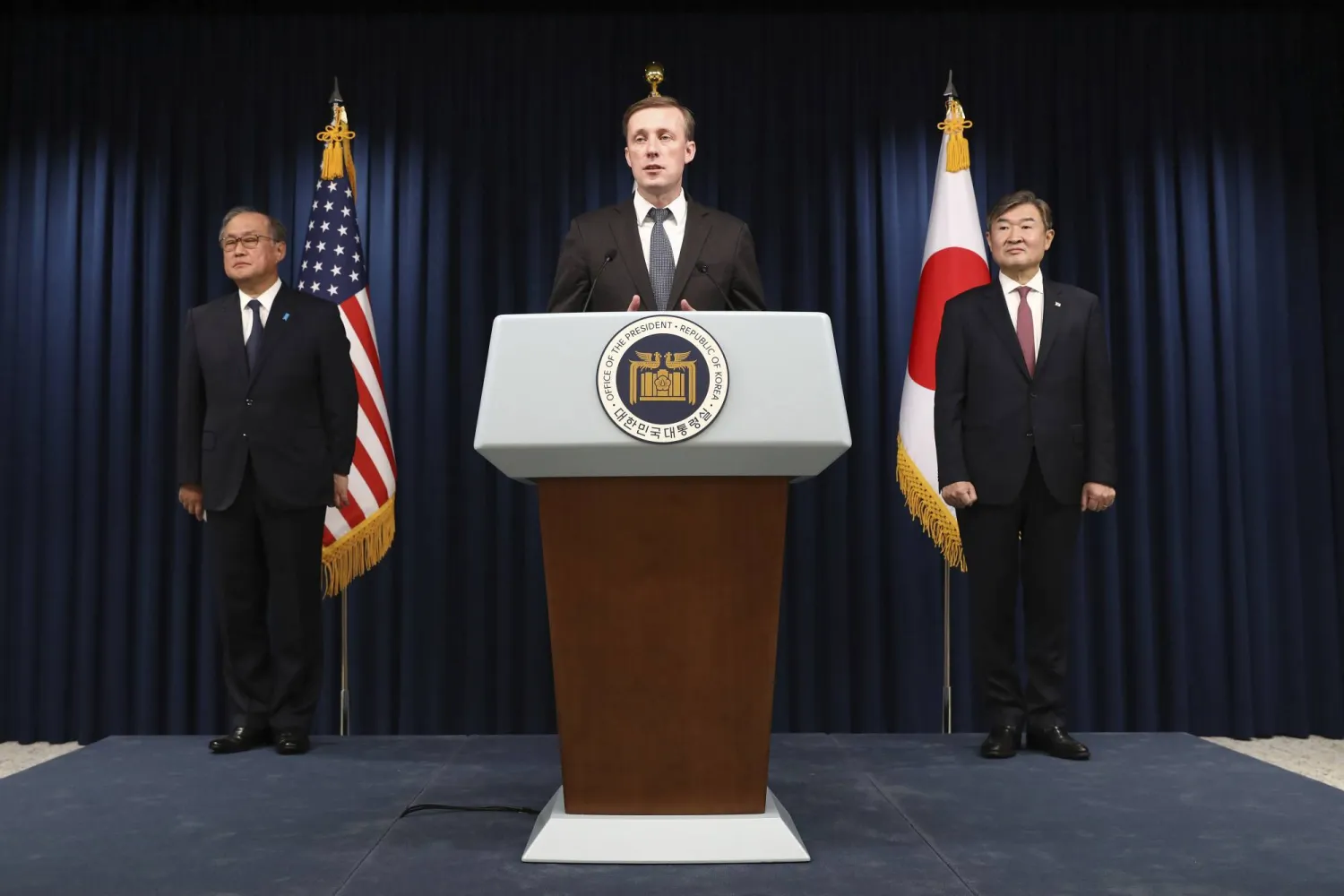 US National Security Advisor Jake Sullivan, center, speaks at a joint news conference with South Korea's National Security Adviser Cho Tae-yong, right, and Japan's National Security Secretariat Secretary-General Takeo Akiba at the presidential office, Saturday, Dec. 9, 2023, in Seoul, South Korea. (Chung Sung-Jun/Pool Photo via AP)
