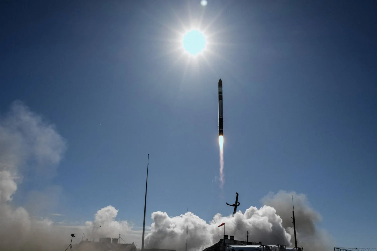 In this image released by Rocket Lab, a electron rocket successfully takes off from its launch site on the Mahia Peninsula, New Zealand, Friday, Dec. 15, 2023. (Rocket Lab via AP)