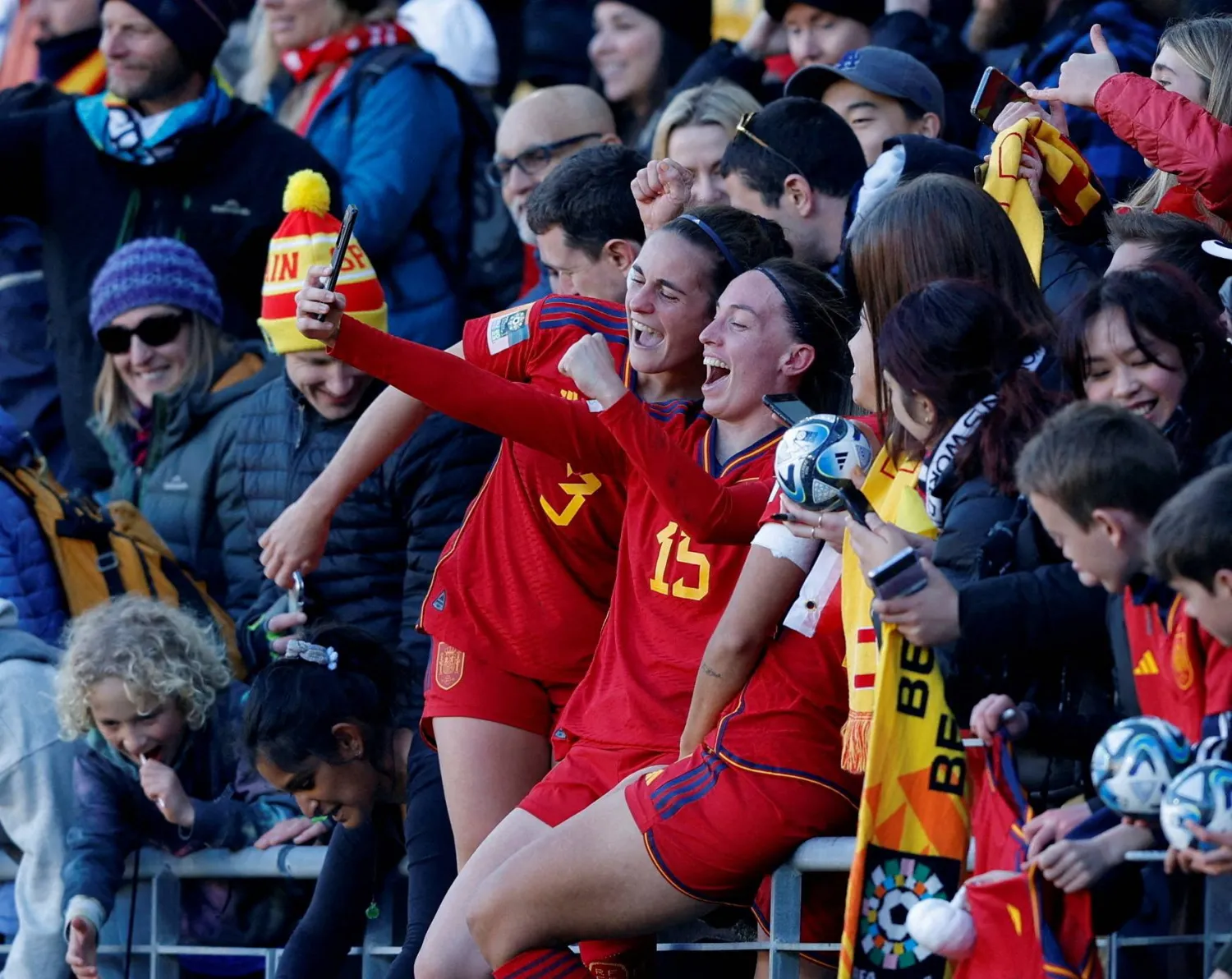 FILE PHOTO: Soccer Football - FIFA Women’s World Cup Australia and New Zealand 2023 - Quarter Final - Spain v Netherlands - Wellington Regional Stadium, Wellington, New Zealand - August 11, 2023 Spain's Teresa Abelleira and Eva Navarro celebrate with fans after progressing to the semi finals of the World Cup REUTERS/Amanda Perobelli/File Photo