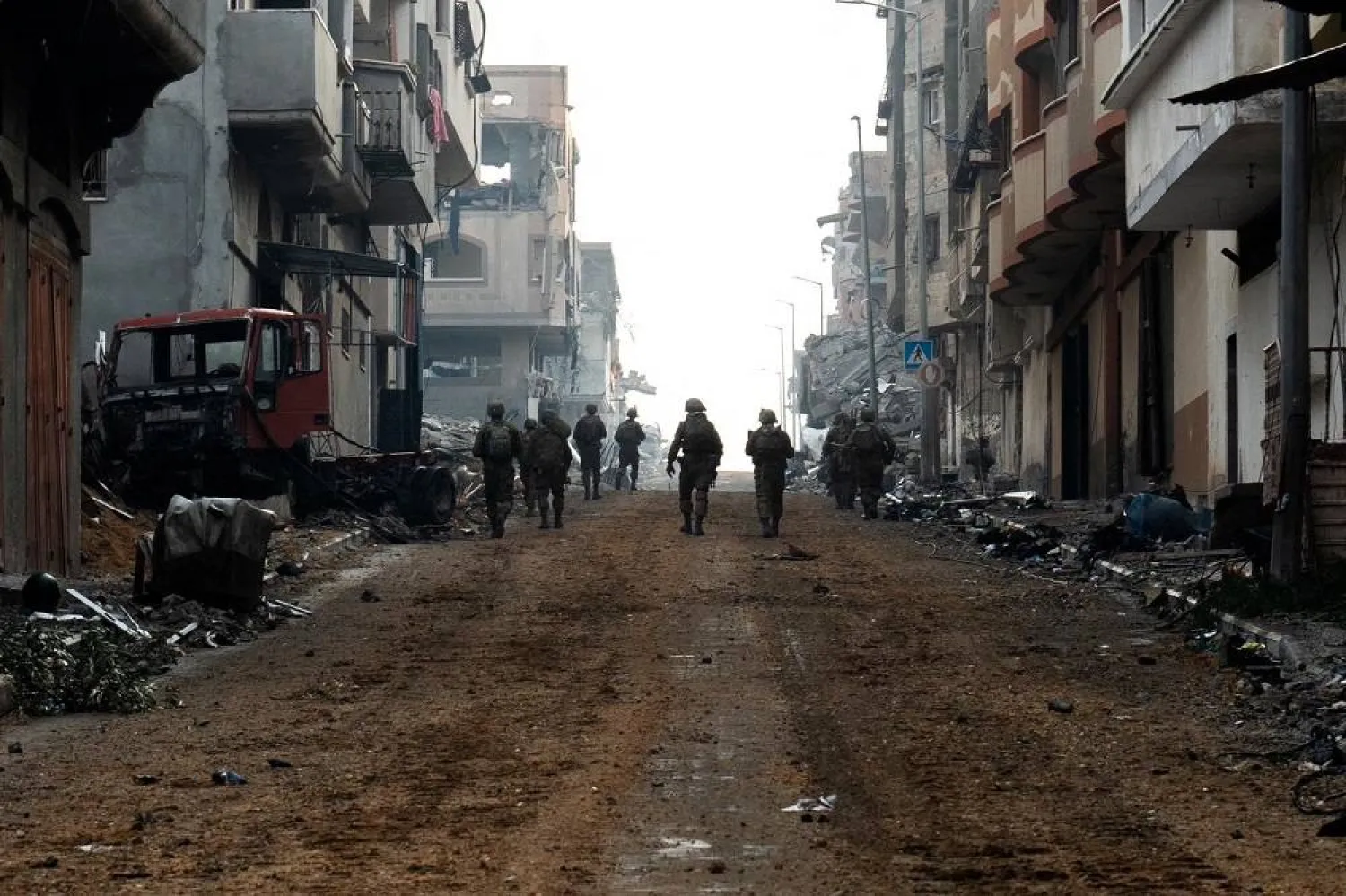 Israeli soldiers operate in the Gaza Strip amid the ongoing conflict between Israel and the Palestinian group Hamas, in this handout picture released on December 18, 2023. (Israel Defense Forces/Handout via Reuters)