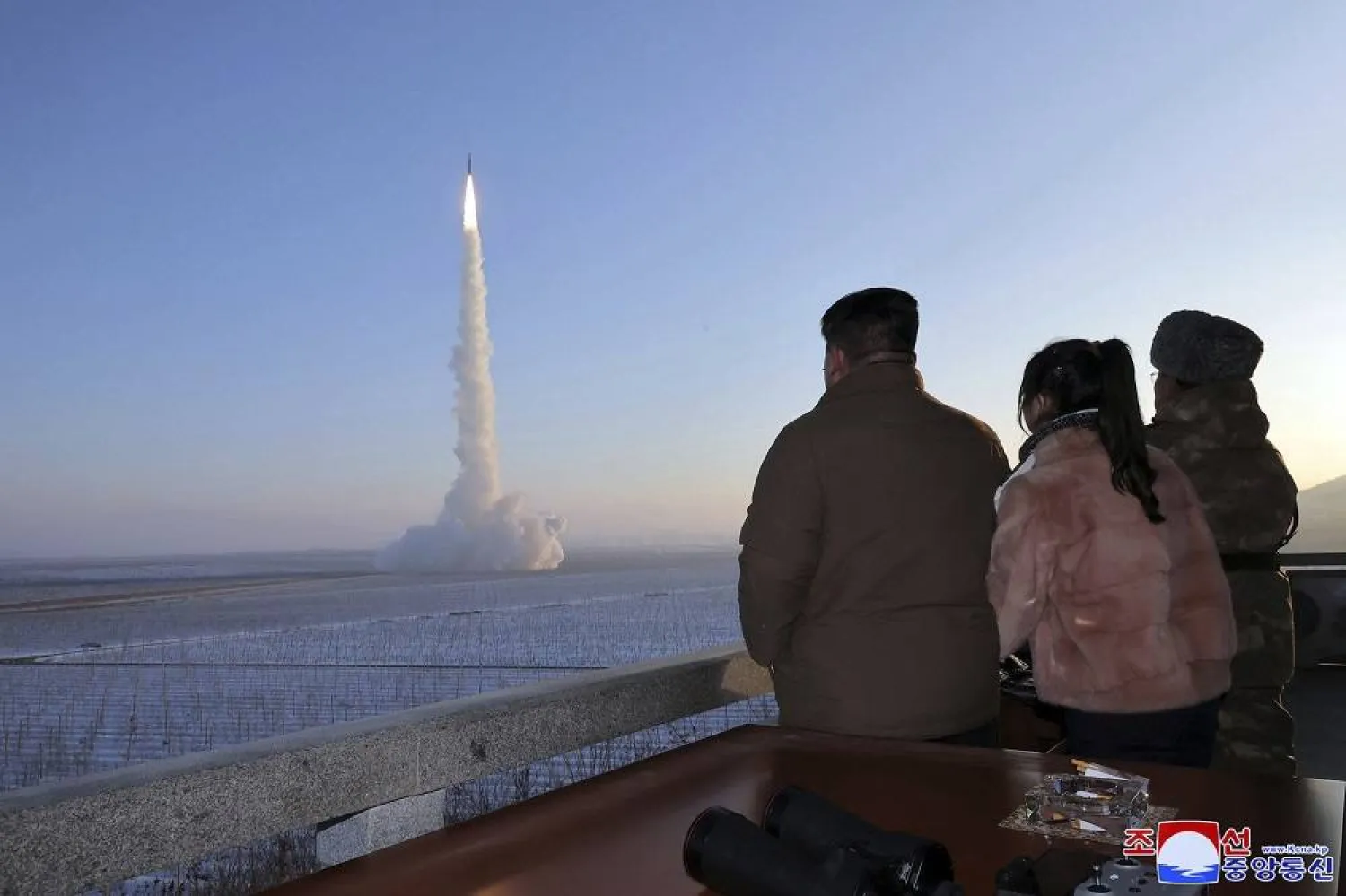 In this undated photo provided Monday, Dec. 18, 2023, by the North Korean government, North Korean leader Kim Jong Un, his daughter and an official watch what it says is an intercontinental ballistic missile launching from an undisclosed location in North Korea. (Korean Central News Agency/Korea News Service via AP) 