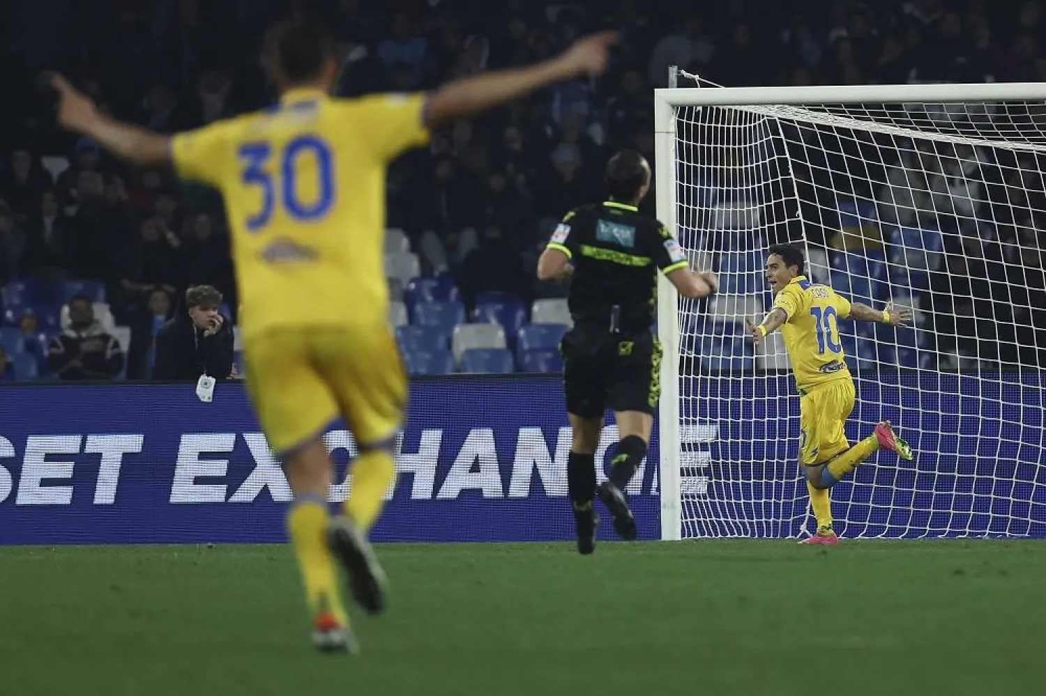 Frosinone's Giuseppe Caso, right, celebrates scoring his side's second goal of the game during the Italian Cup soccer match between Napoli and Frosinone at the Diego Armando Maradona stadium in Naples, Italy, Tuesday, Dec. 19, 2023. (AP)