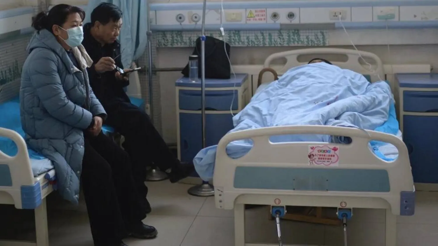 Doctors attended to quake survivors with mild injuries at the Jishishan County People's Hospital. Pedro Pardo / AFP

