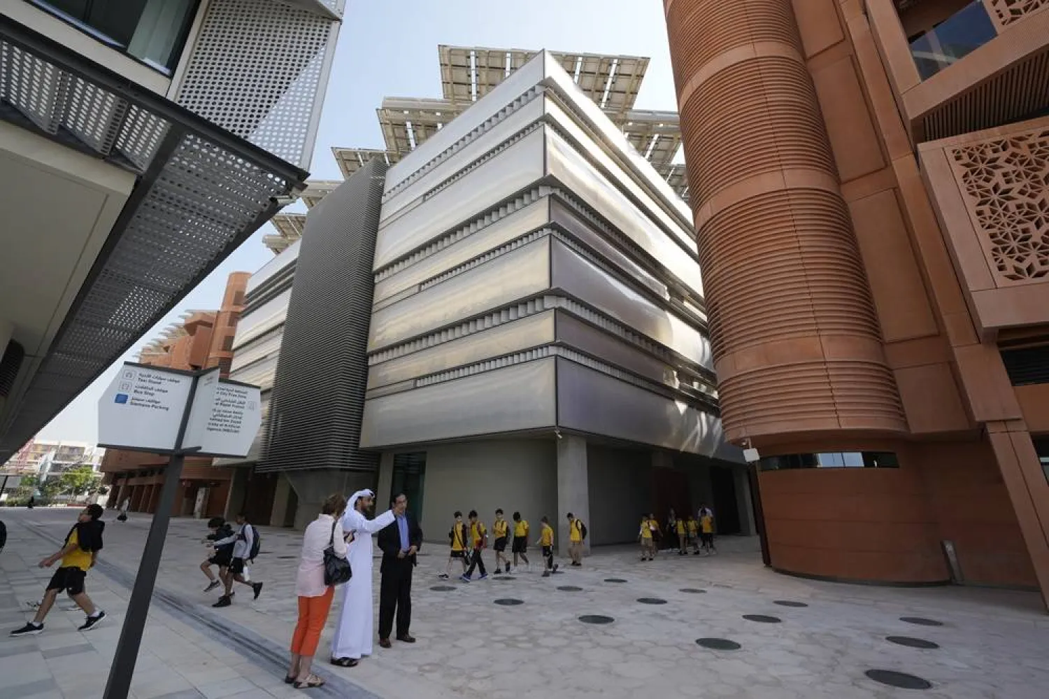  People visit Masdar City near Abu Dhabi, United Arab Emirates, as Dubai hosts the COP28 UN Climate Summit, Friday, Dec. 8, 2023. (AP)