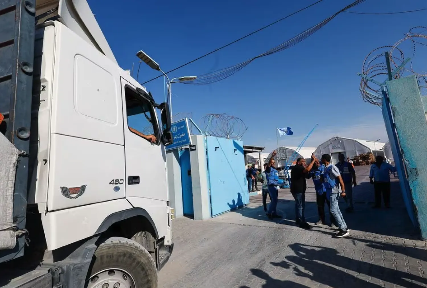 An aid truck arrives at a UN storage facility as the conflict between Israel and the Palestinian group Hamas continues in the central Gaza Strip. (Reuters)
