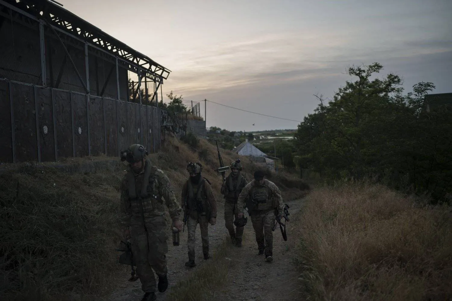 Ukrainian special operations forces on a night mission in the Kherson region. (AP) 

