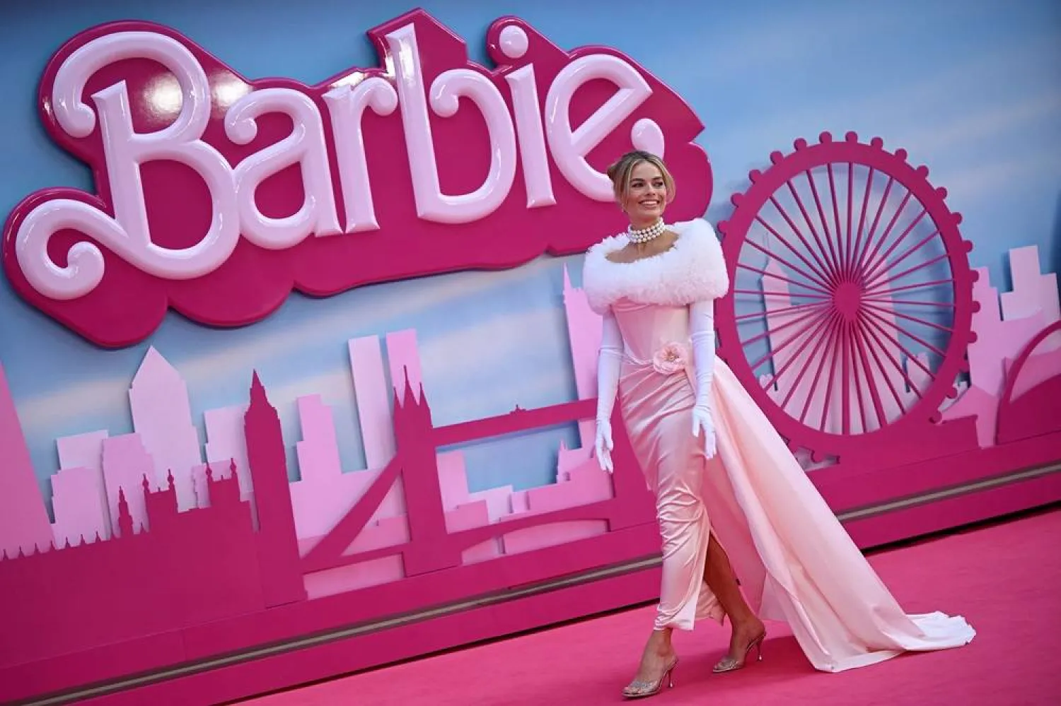 Australian actress Margot Robbie poses on the pink carpet upon arrival for the European premiere of "Barbie" in central London on July 12, 2023. (AFP)