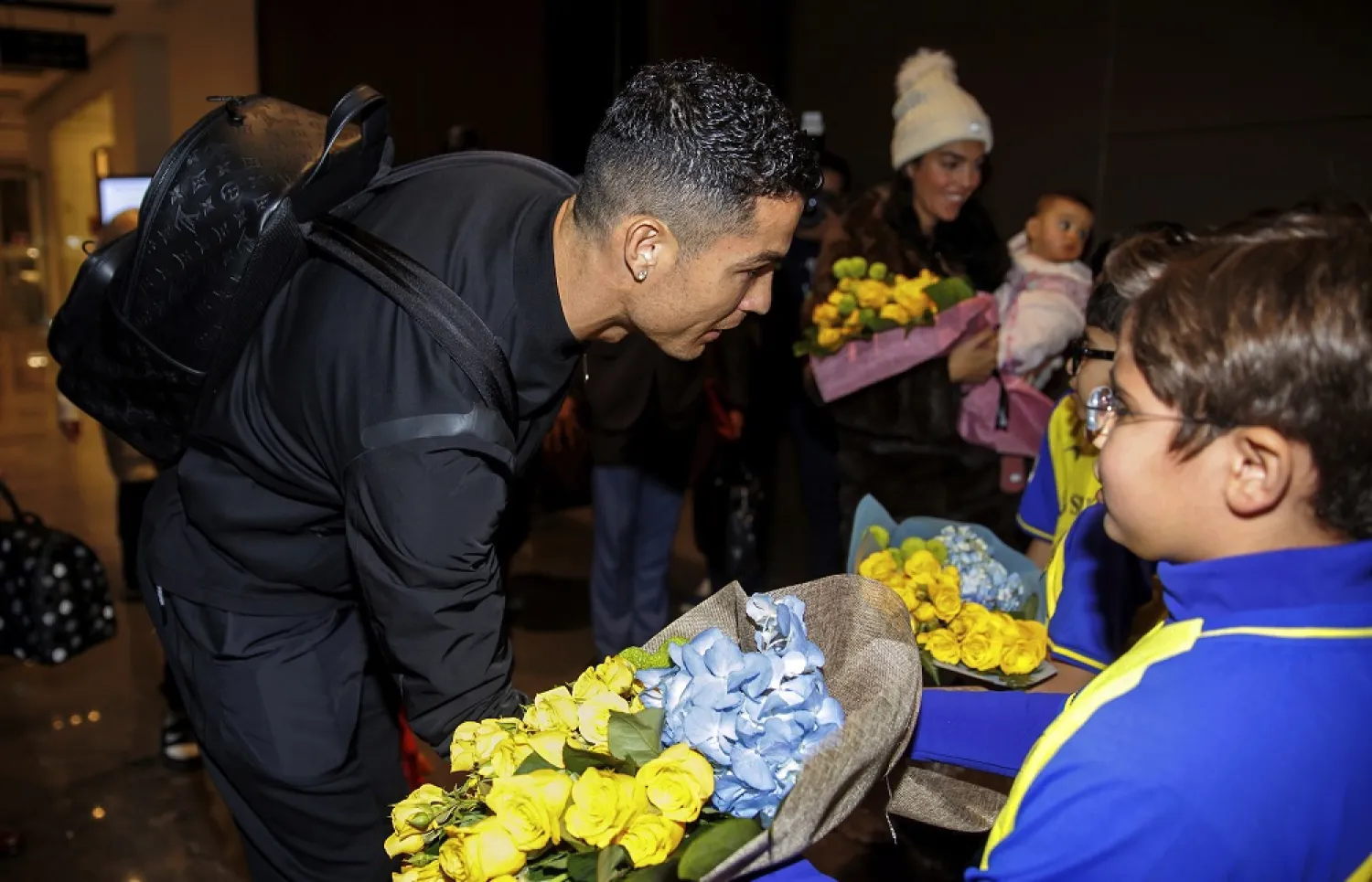 In this photo provided by Al Nasr Club, Cristiano Ronaldo arrives at Riyadh International Airport, late Monday, Jan. 2, 2023. (Courtesy of Al-Nasr Club via AP)
