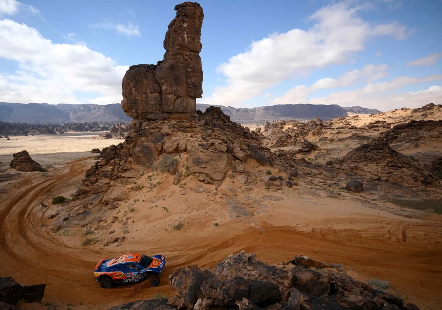 Spanish driver Laia Sainz and Italian co-driver Maurizio Gerini compete during the fourth stage of the 2023 Dakar rally around Ha'il in Saudi Arabia on January 4, 2023. (AFP)