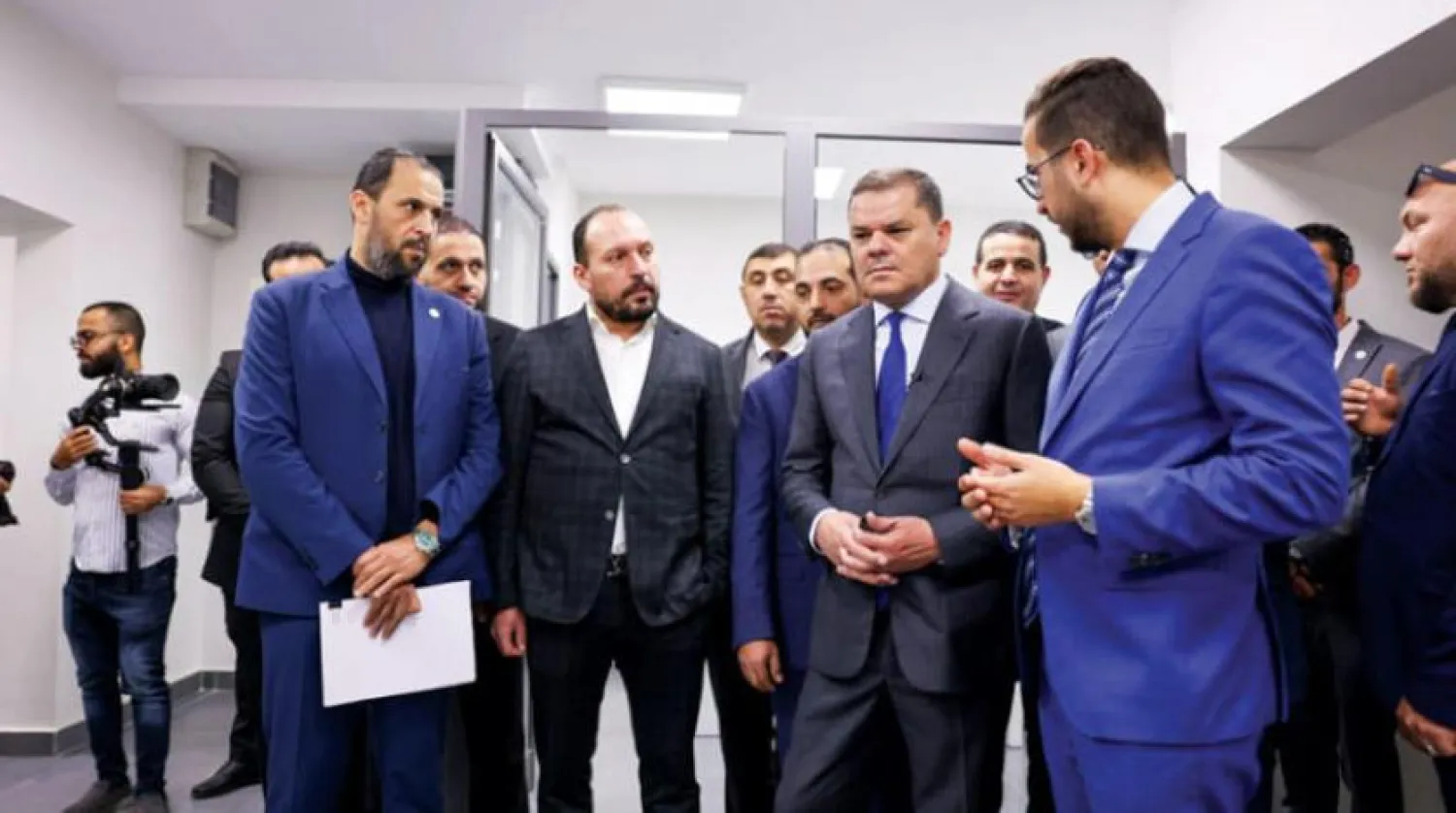 Interim Libyan Prime Minister Abdul Hamid Dbeibeh attends the opening of a government services office in Tripoli. (Photo: Unity Government)

