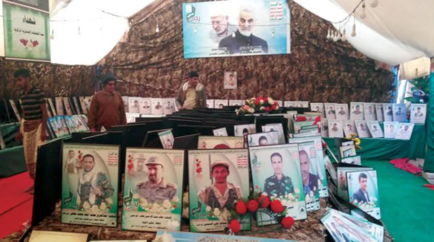 Pictures of the commander of the al-Quds Force, Qassem Soleimani, and the head of the Popular Mobilization Forces (PMF), Abu Mahdi al-Muhandis, in Sanaa (Asharq Al-Awsat)
