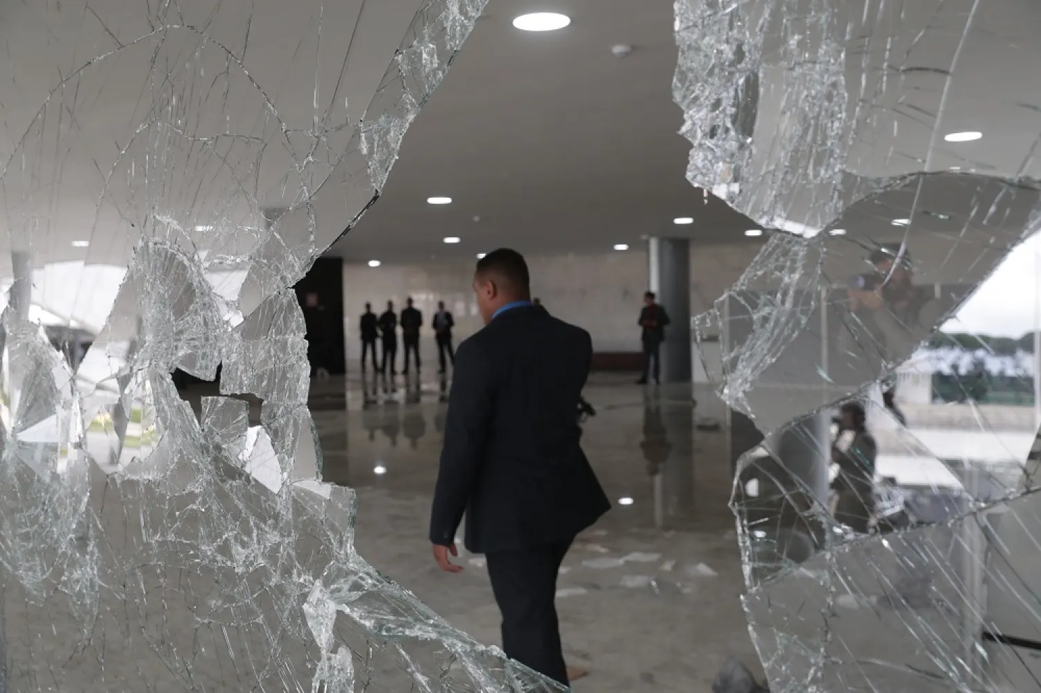 Officials inspect the damage to the Planalto Palace after Bolsonaro supporters took over the Plaza de los Tres Poderes (Square of the Three Powers) to invade government buildings, in Brasilia, Brazil, 09 January 2023. (EPA)
