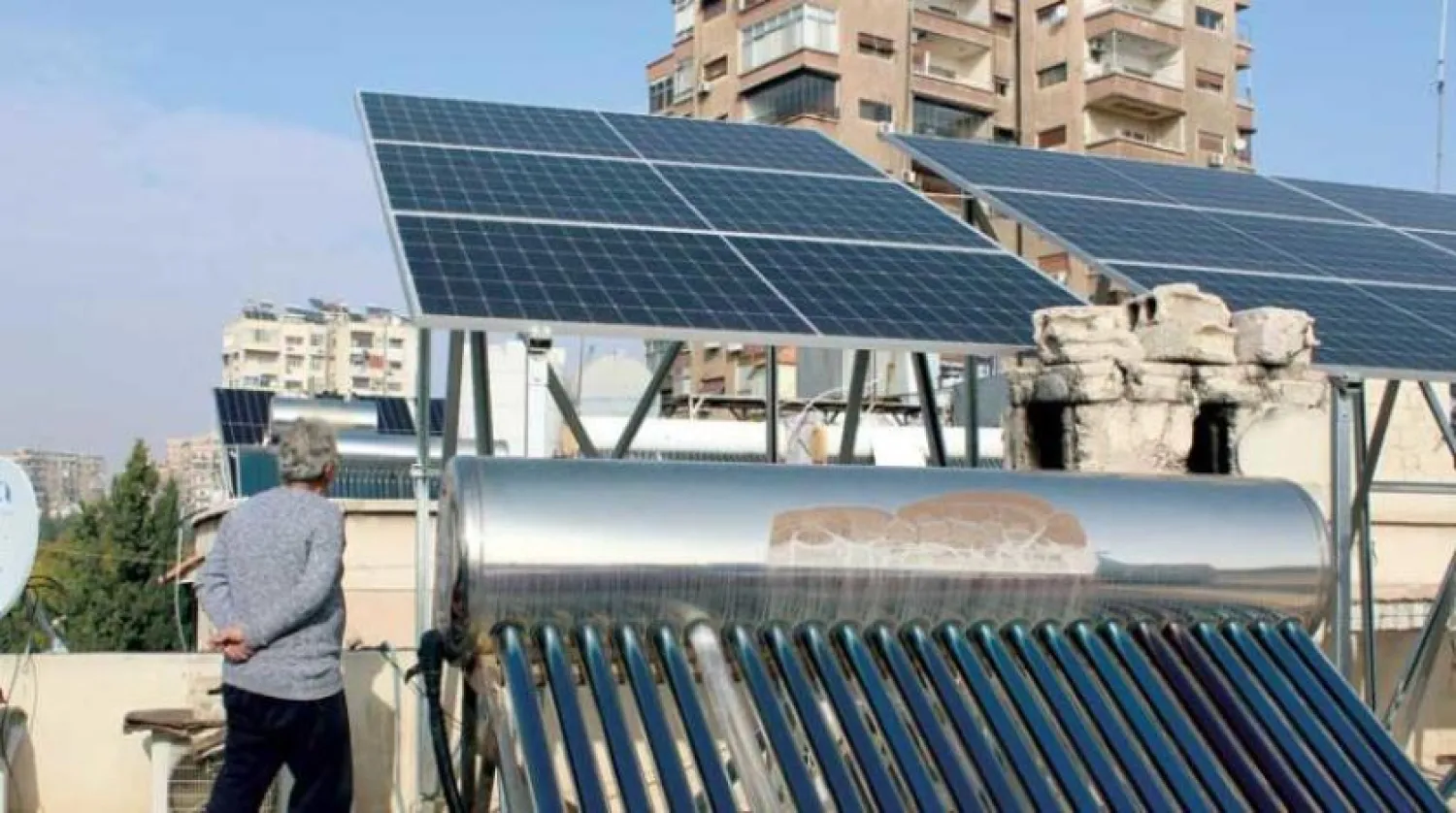 Solar panels on top of a building in the Syrian capital, Damascus. (Reuters)