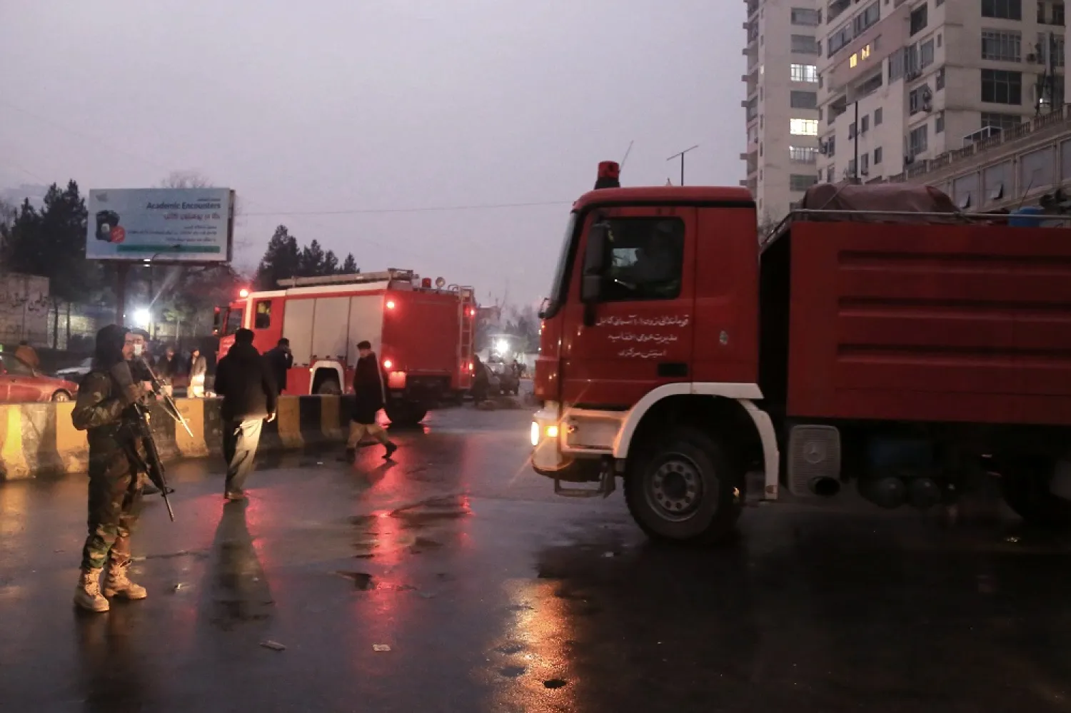 A fire truck (L) at the scene of a bomb blast outside the Afghan foreign ministry in Kabul, Afghanistan, 11 January 2023. (EPA)