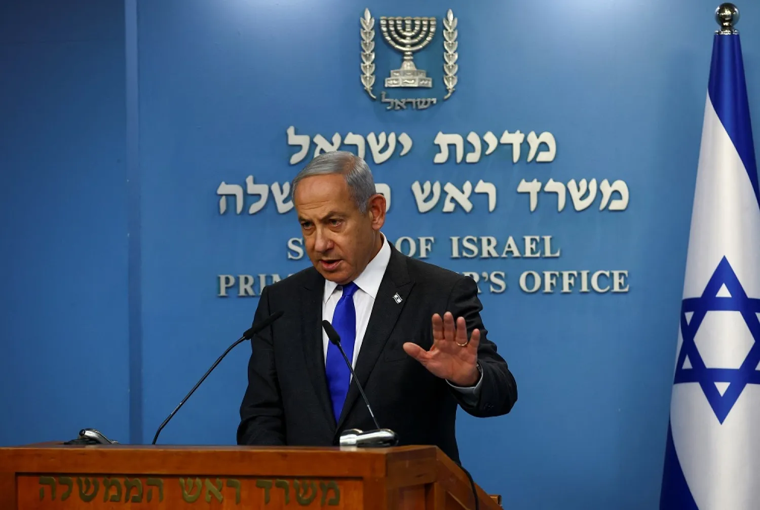 Israeli Prime Minister Benjamin Netanyahu speaks as he and Finance Minister Bezalel Smotrich hold a news conference to present their plan for dealing with price increases in Israel's economy at the Prime Minister's office in Jerusalem, January 11, 2023. (Reuters)