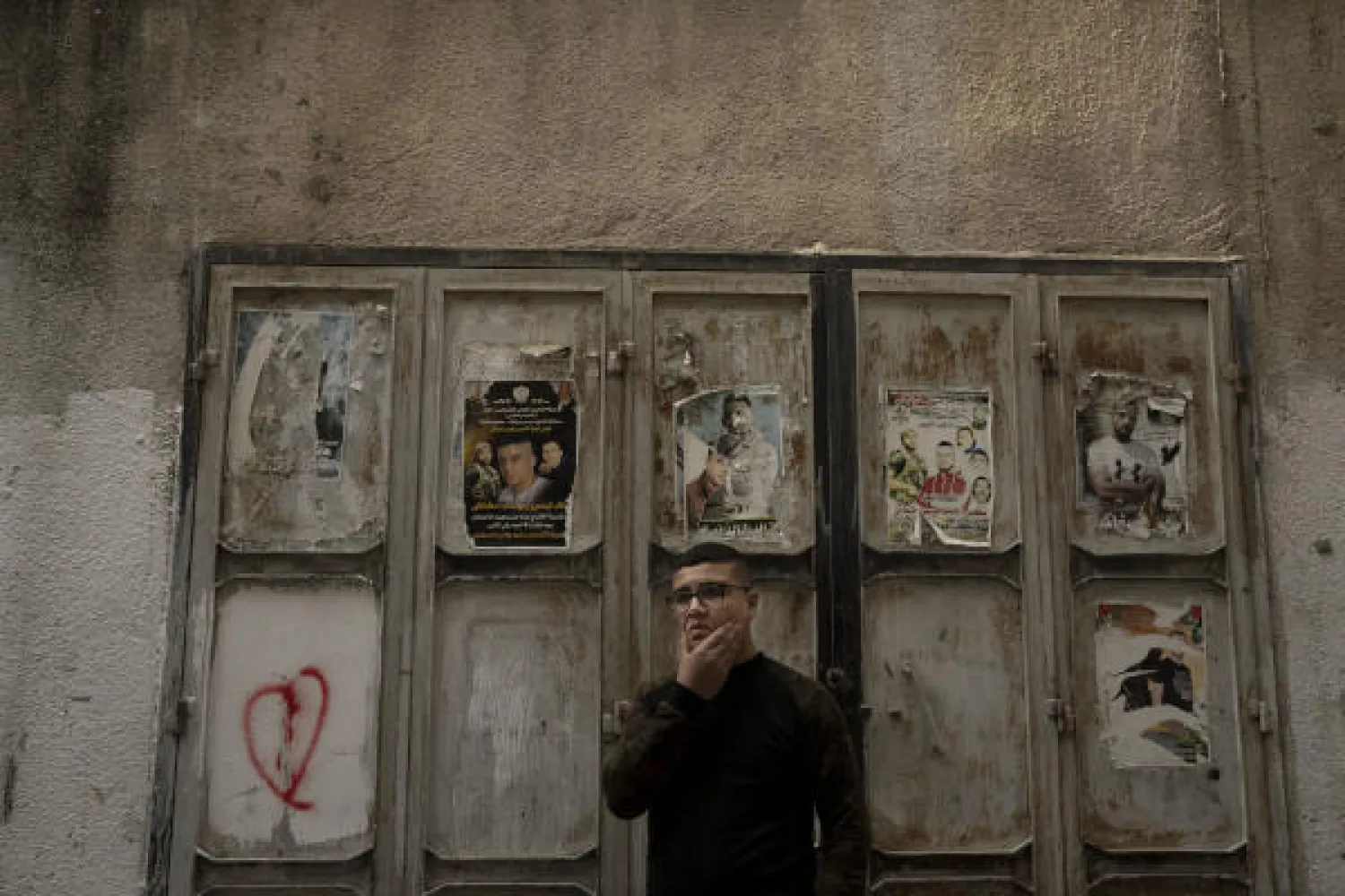 Yousef Mesheh, 15, who was detained along with his brother in a 3 a.m. raid by Israeli forces, stands in an alleyway in the Balata Refugee Camp in the northern West Bank, Tuesday, Jan. 10, 2023. (AP Photo/ Maya Alleruzzo)
