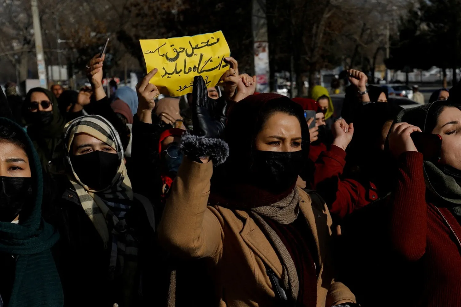 Afghan women chant slogans in protest against the closure of universities to women by the Taliban in Kabul, Afghanistan, December 22, 2022. (Reuters)