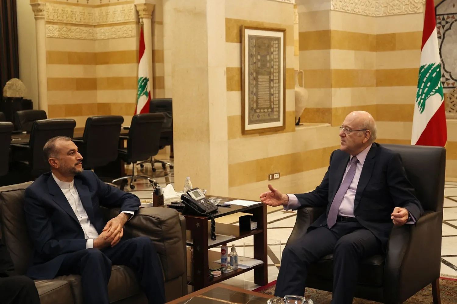Lebanon's caretaker Prime Minister Najib Mikati (R) meets with Iran's Foreign Minister Hossein Amir-Abdollahian in the capital Beirut on January 13, 2023. (AFP)