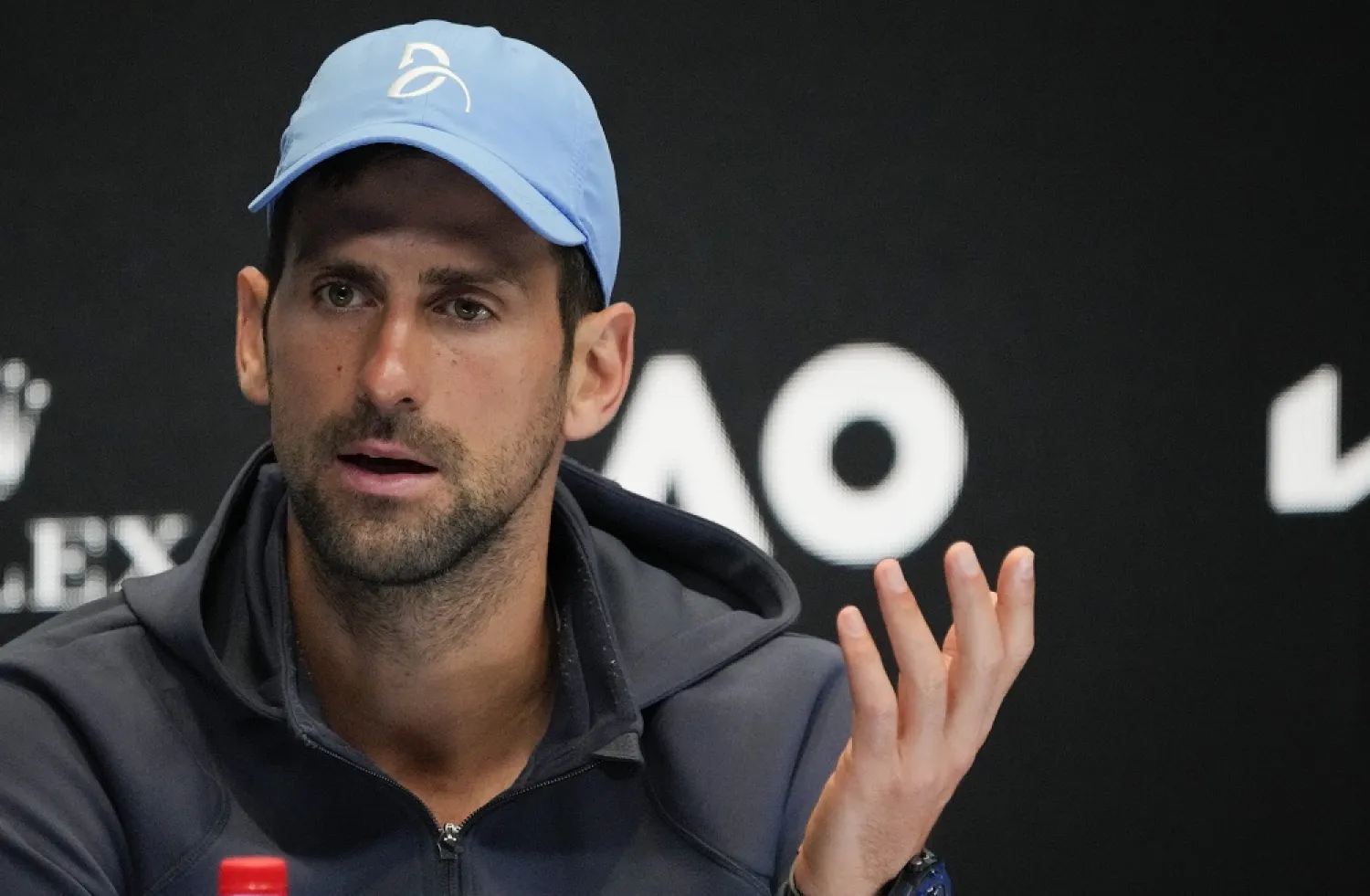 Serbia's Novak Djokovic gestures during a press conference ahead of the Australian Open tennis championship in Melbourne, Australia, Saturday, Jan. 14, 2023. (AP)