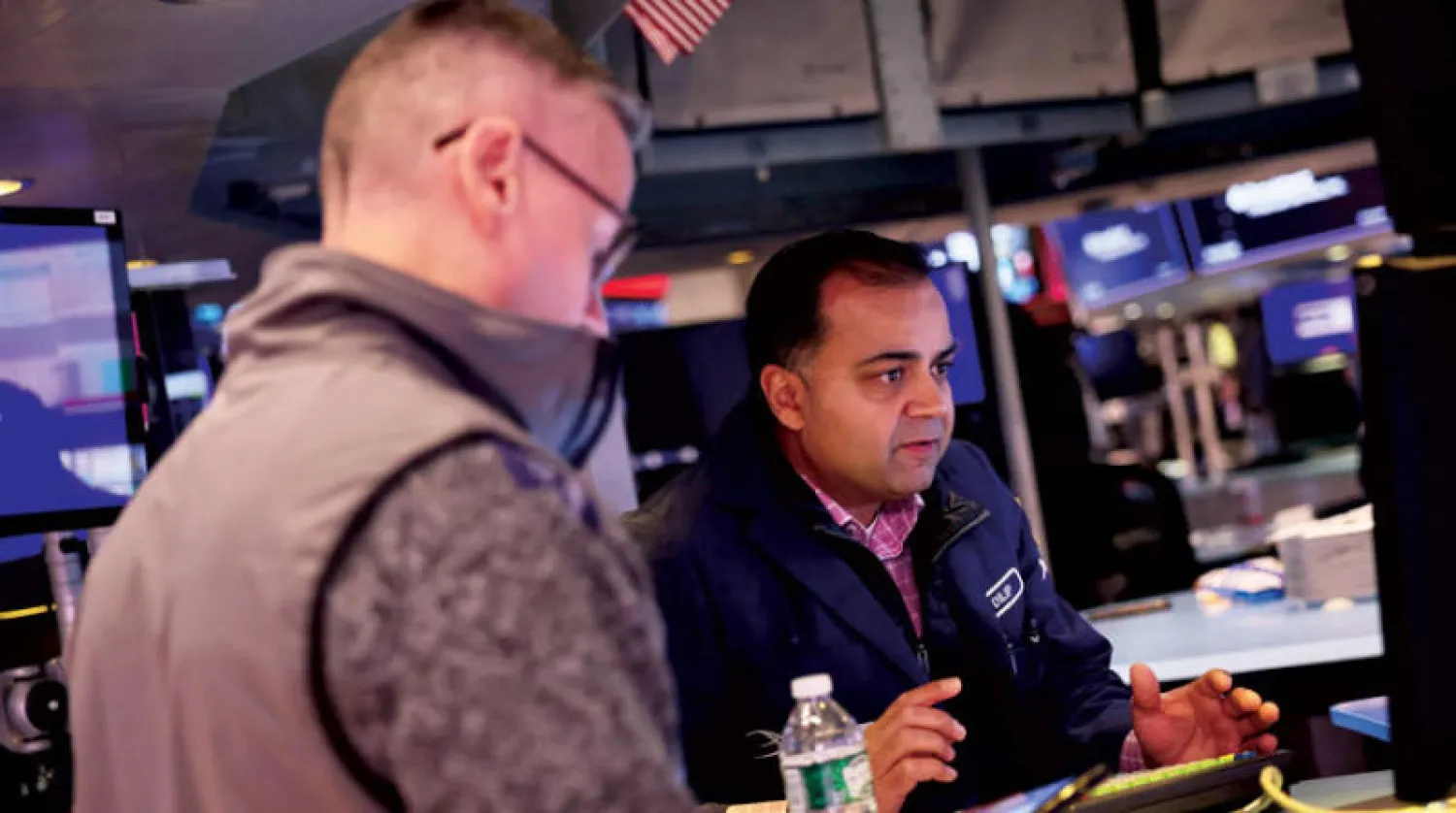 فتحت بورصة نيويورك على تراجع أمس مع نتائج مخيبة لبنك غولدمان ساكس (أ.ف.ب)