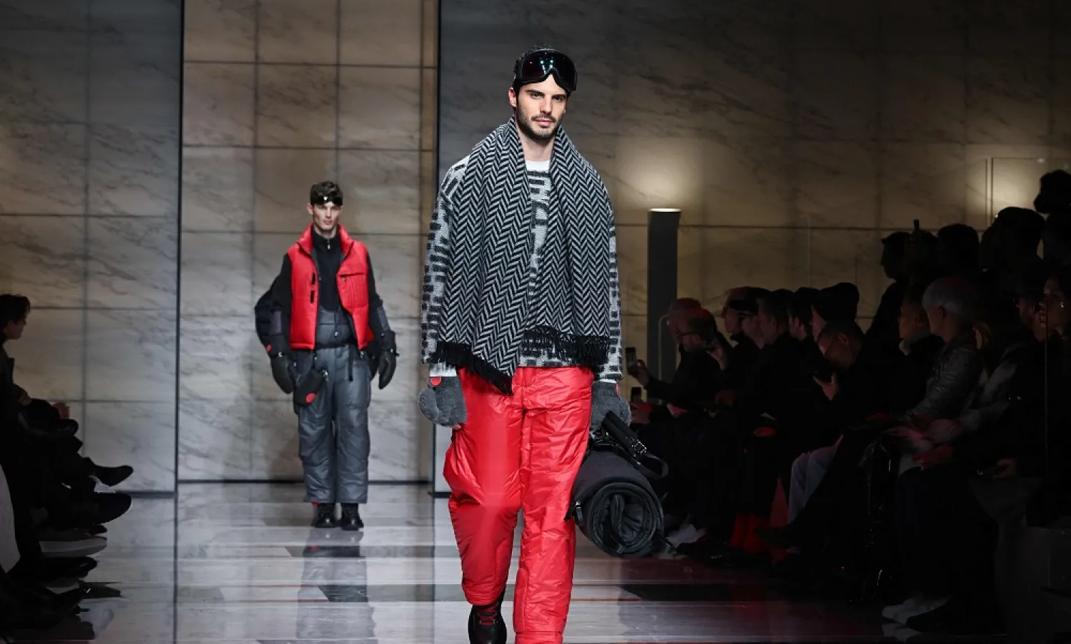 A model presents a creation of Giorgio Armani during the Autumn-Winter 2023-2024 Men's fashion show as part of the Milan Fashion Week on January 16, 2023. (AFP)