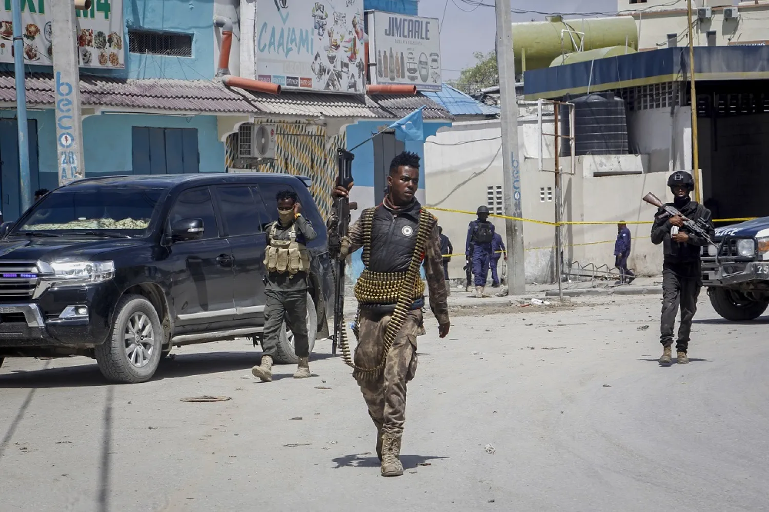 Security forces patrol at the scene, after gunmen stormed the Hayat Hotel in the capital Mogadishu, Somalia on Aug. 21, 2022. (AP)