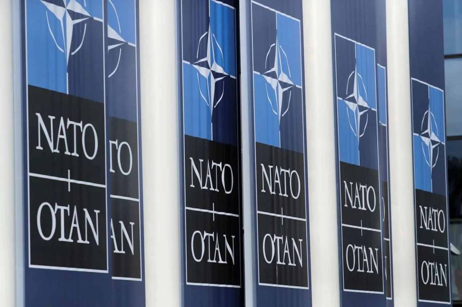 NATO logos are seen at the Alliance headquarters ahead of a NATO Defense Ministers meeting, in Brussels, Belgium, October 21, 2021. (Reuters)